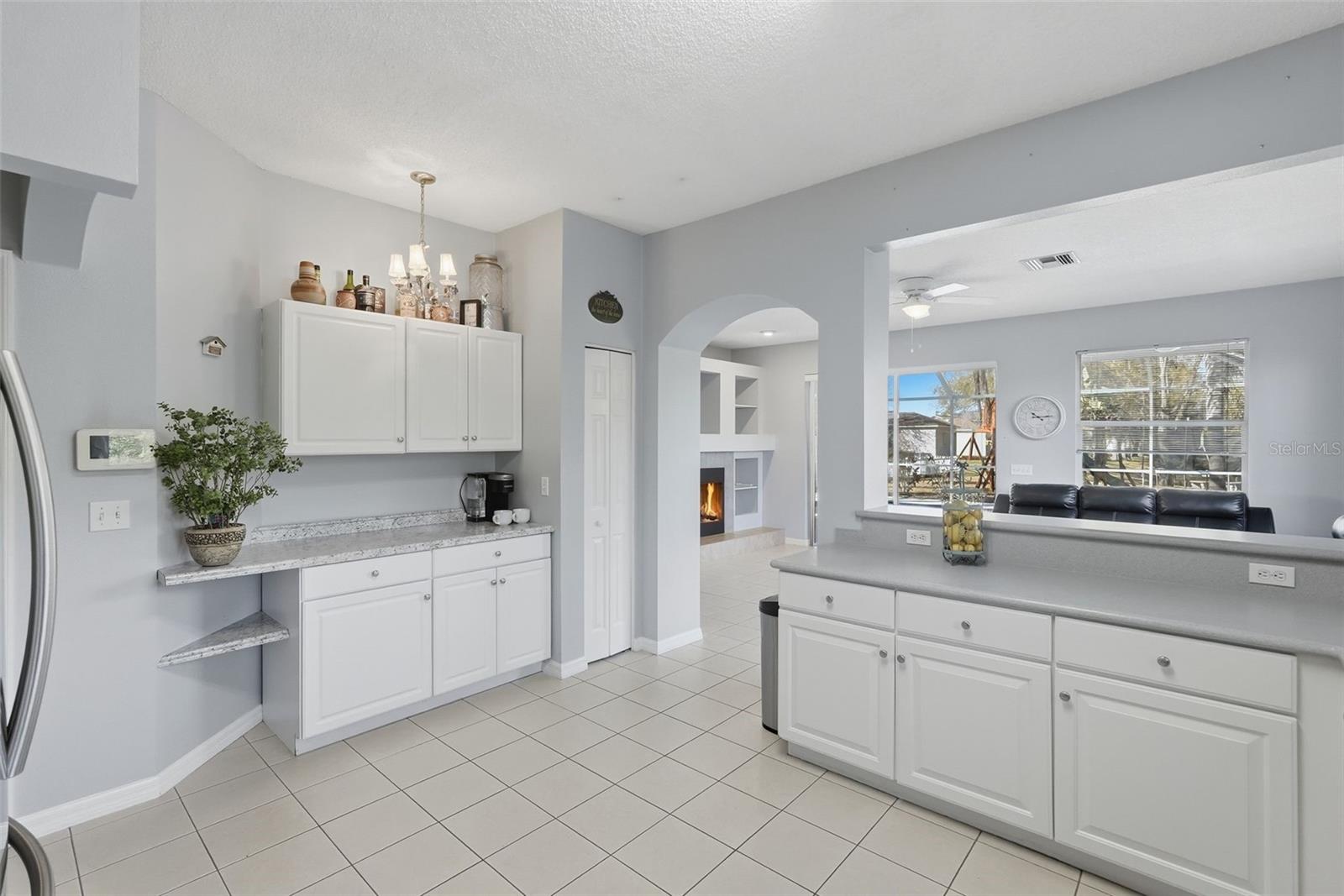 Coffee station or bar area and pantry in the kitchen.  Lots of storage.