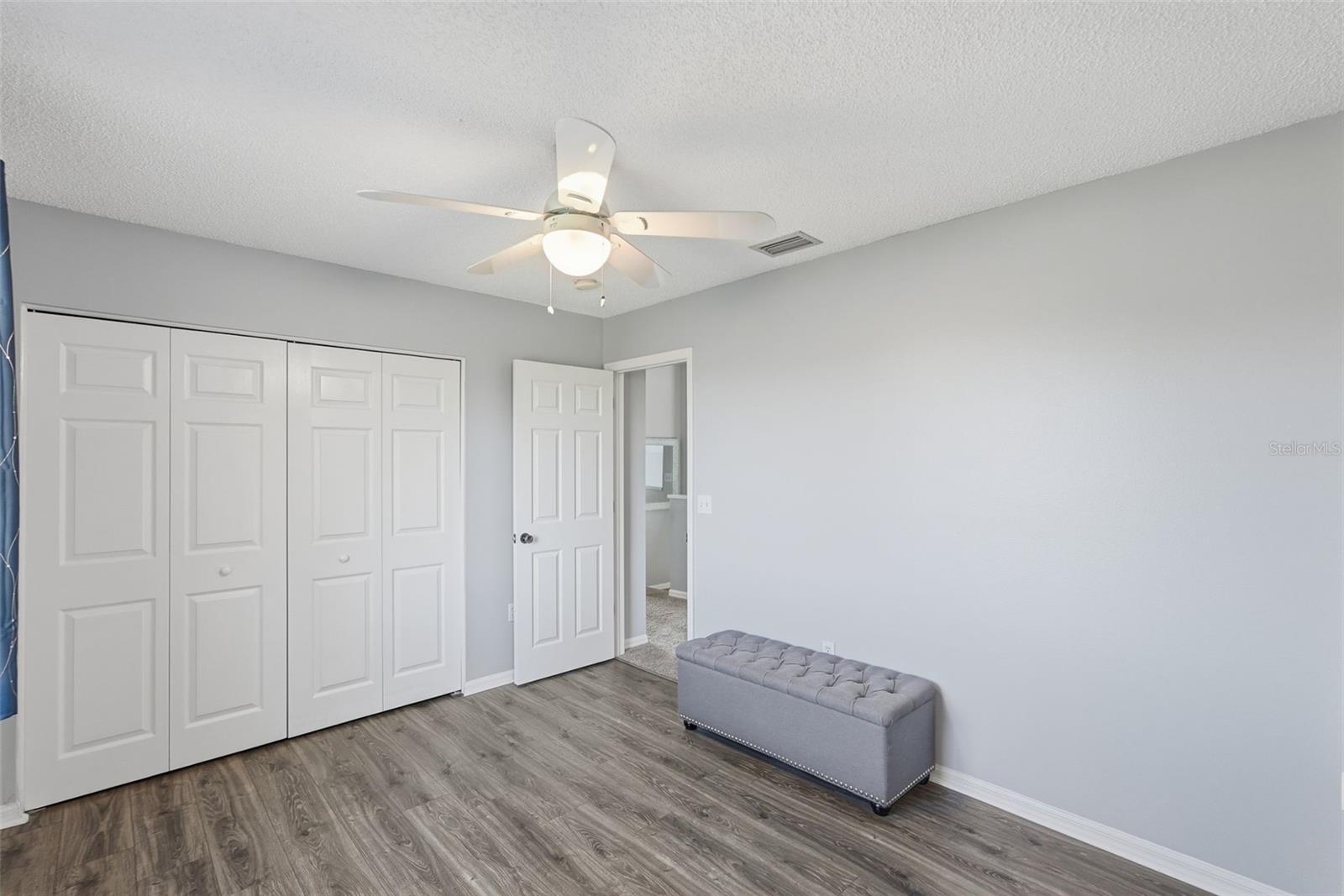 Another view of Bedroom 2 with dual closets.