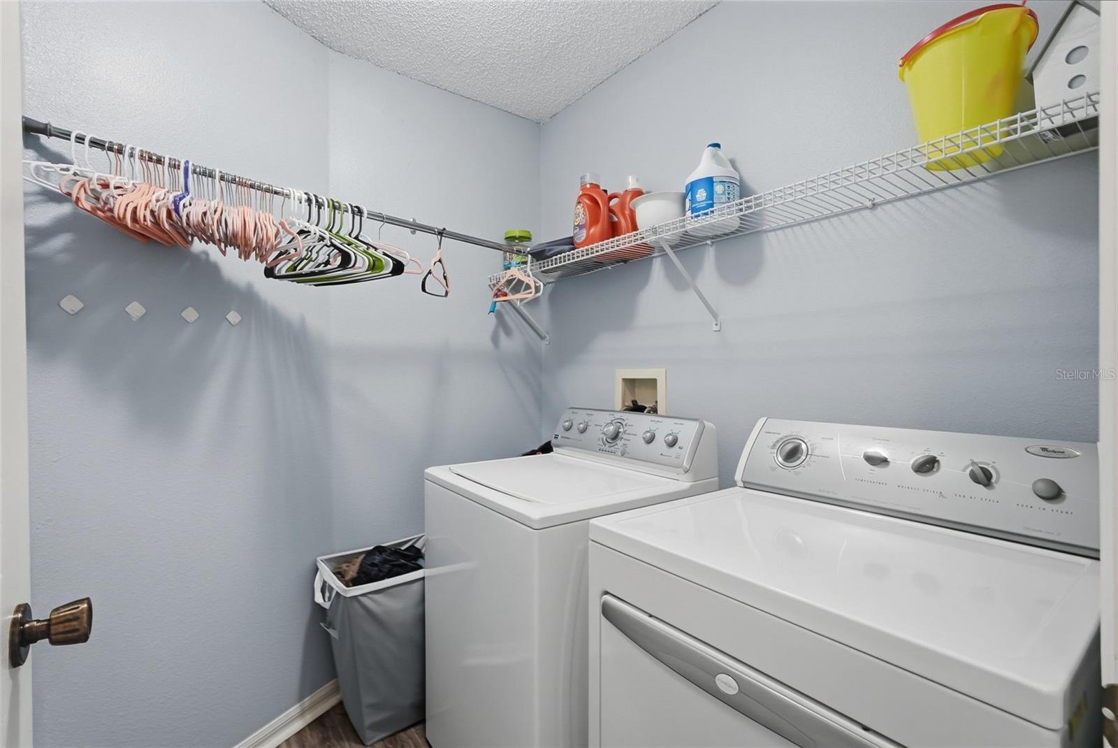 Inside laundry room located on the 2nd floor.  No more dragging clothing up and down the stairs.