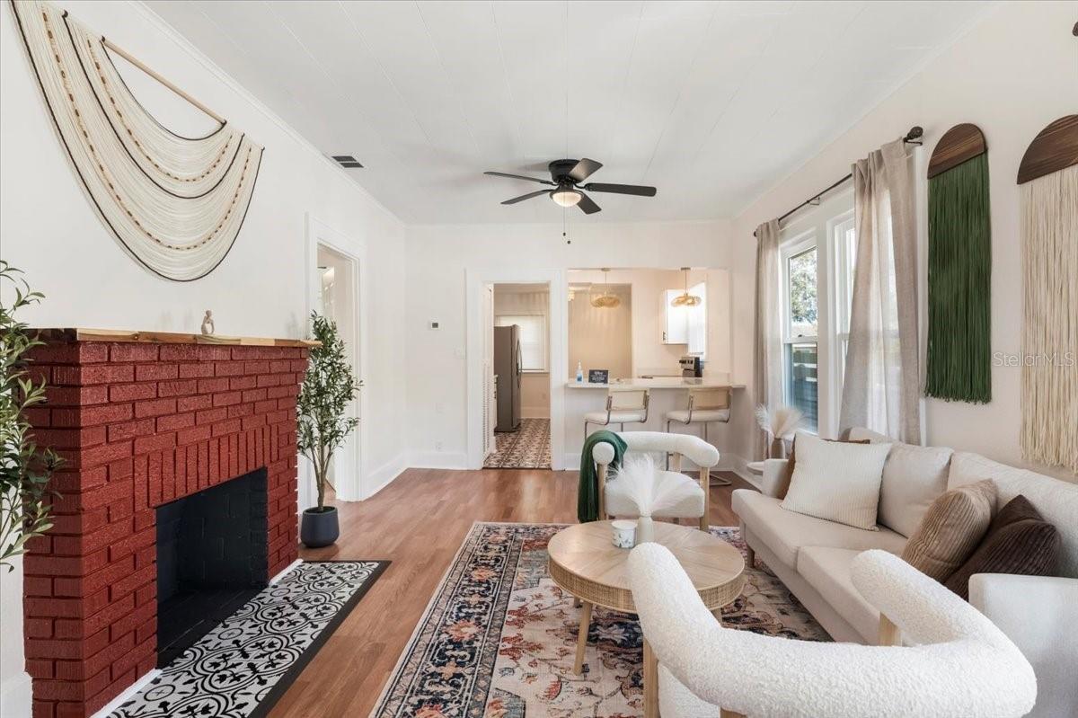 Open concept living room plus kitchen with