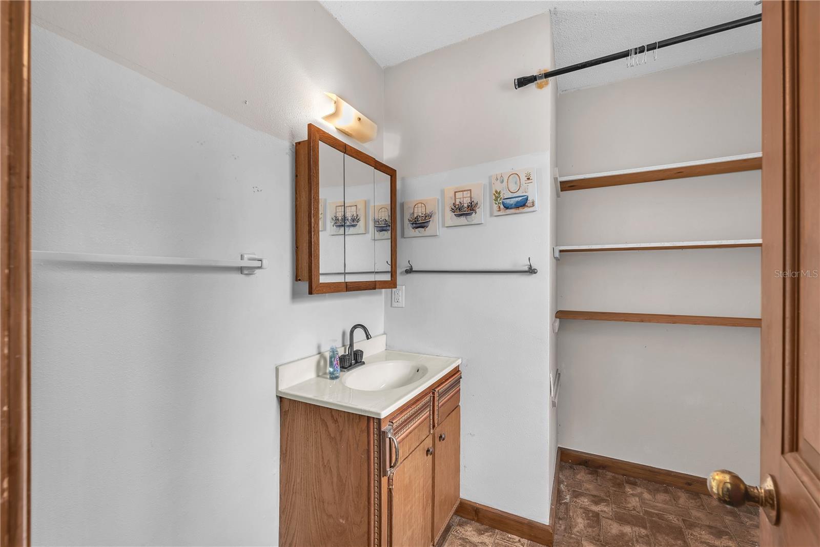 There is a convenient half bath in the garage.