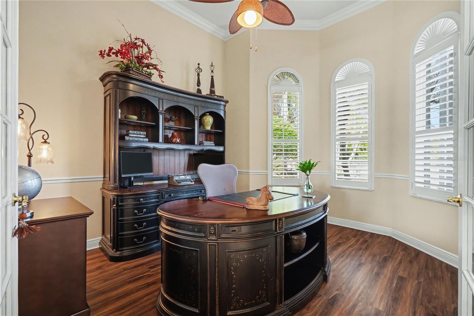 Home office or den with rounded wall