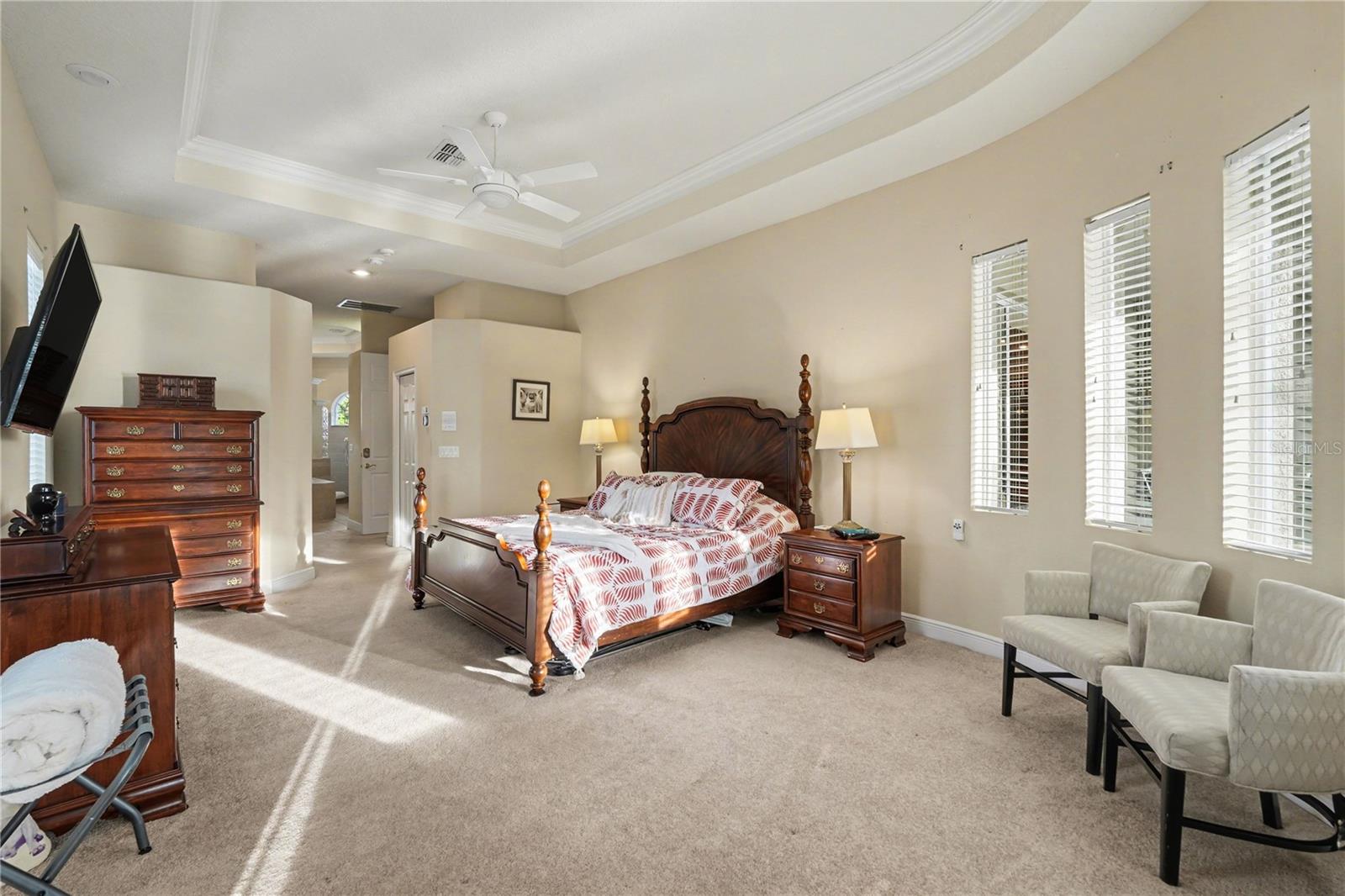 Sitting area and rounded wall with pool view!