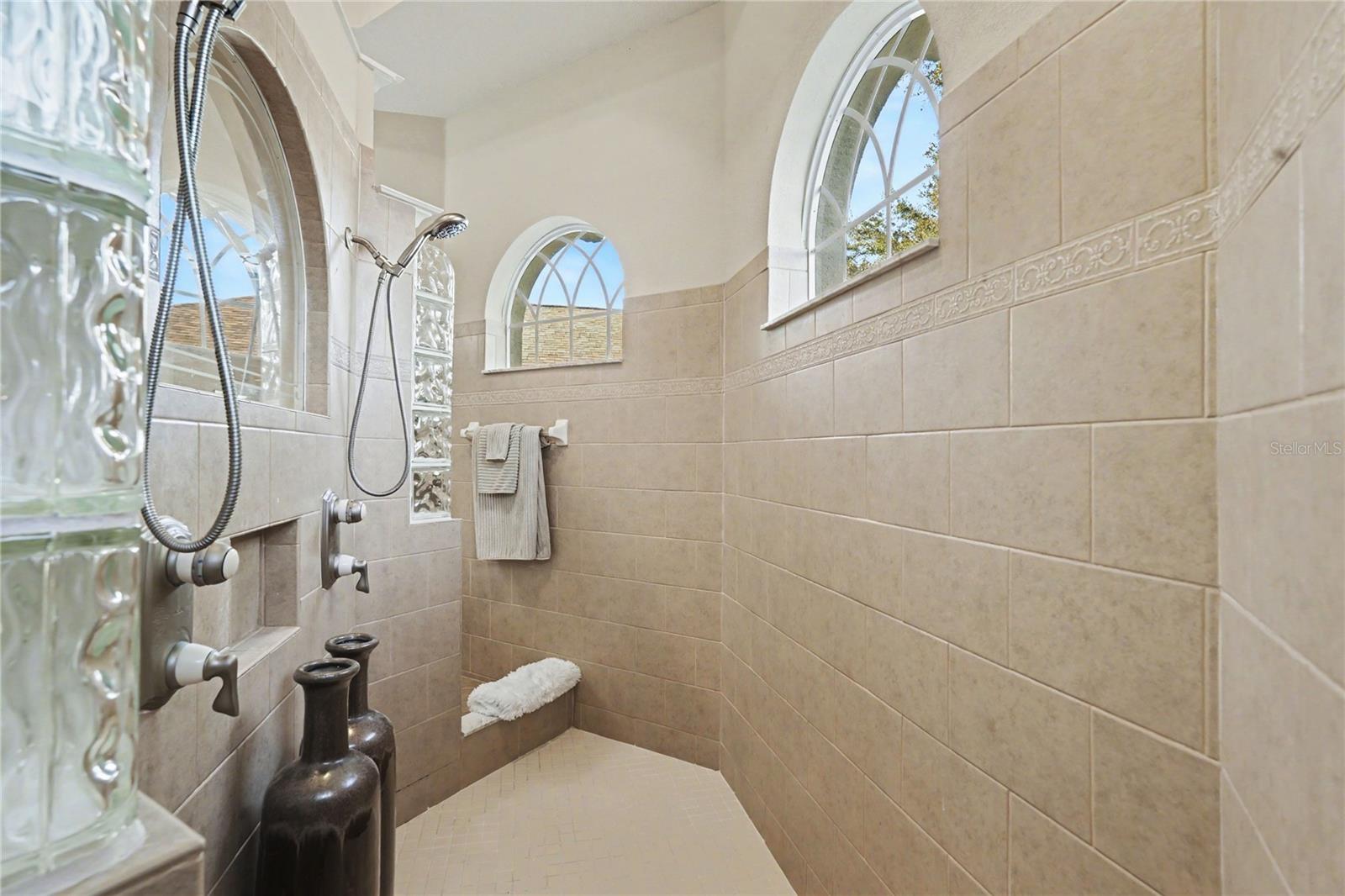 Walk thru shower with 2 showerheads