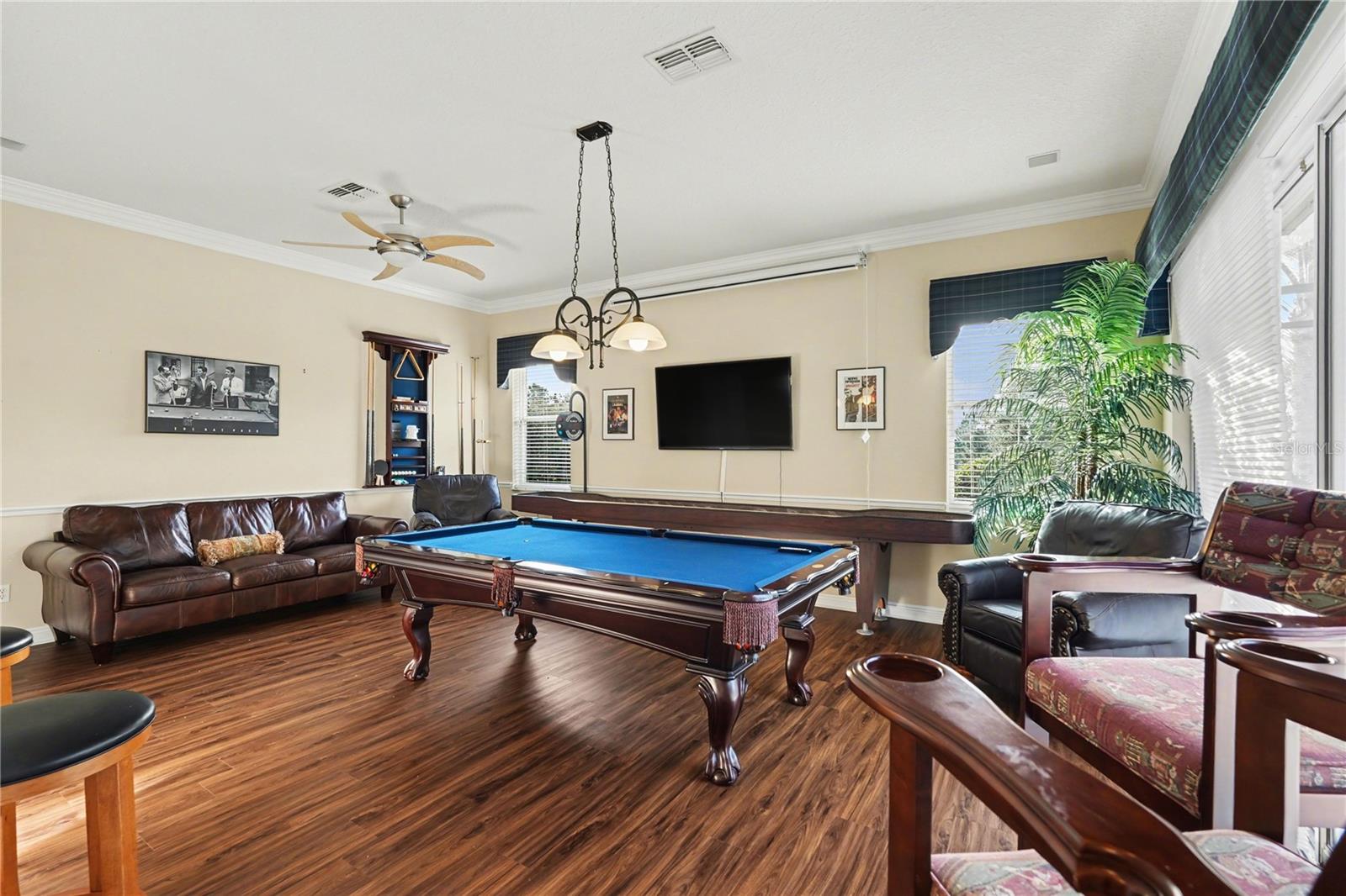 FLEX room set up as gameroom with sliders to Lanai