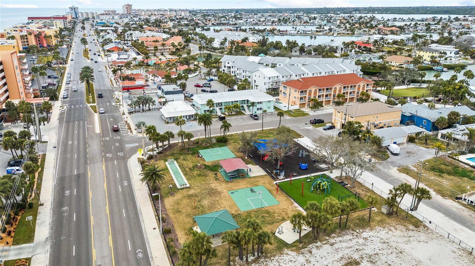 Spacious Beach Park with Playground, Exercise Equipment, Shuffleboard, Basketball Courts, Pavillions and Grills  across the Street