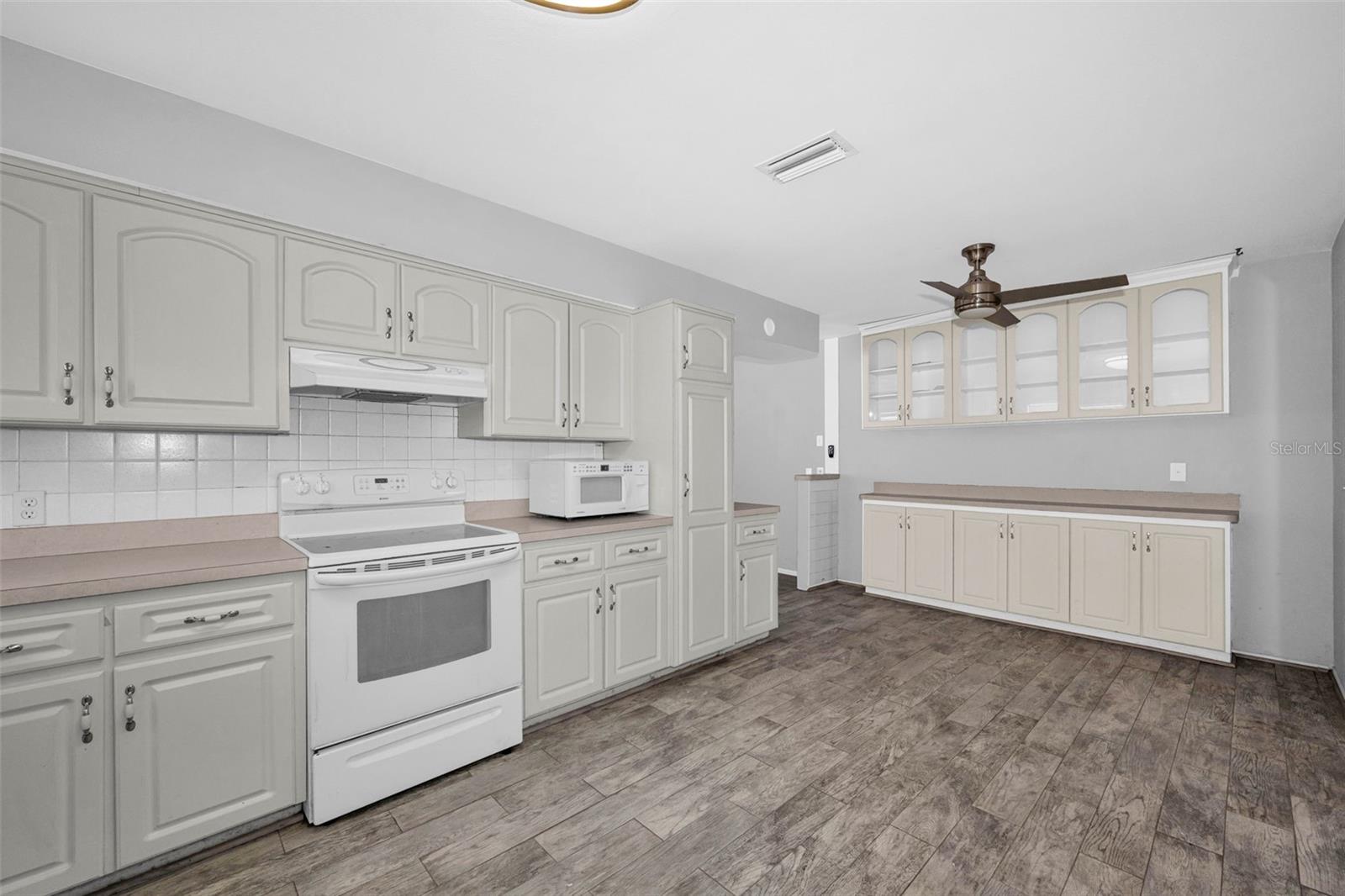 So many Cabinets with closet pantry and you could have an eat-in area in here if you wanted.