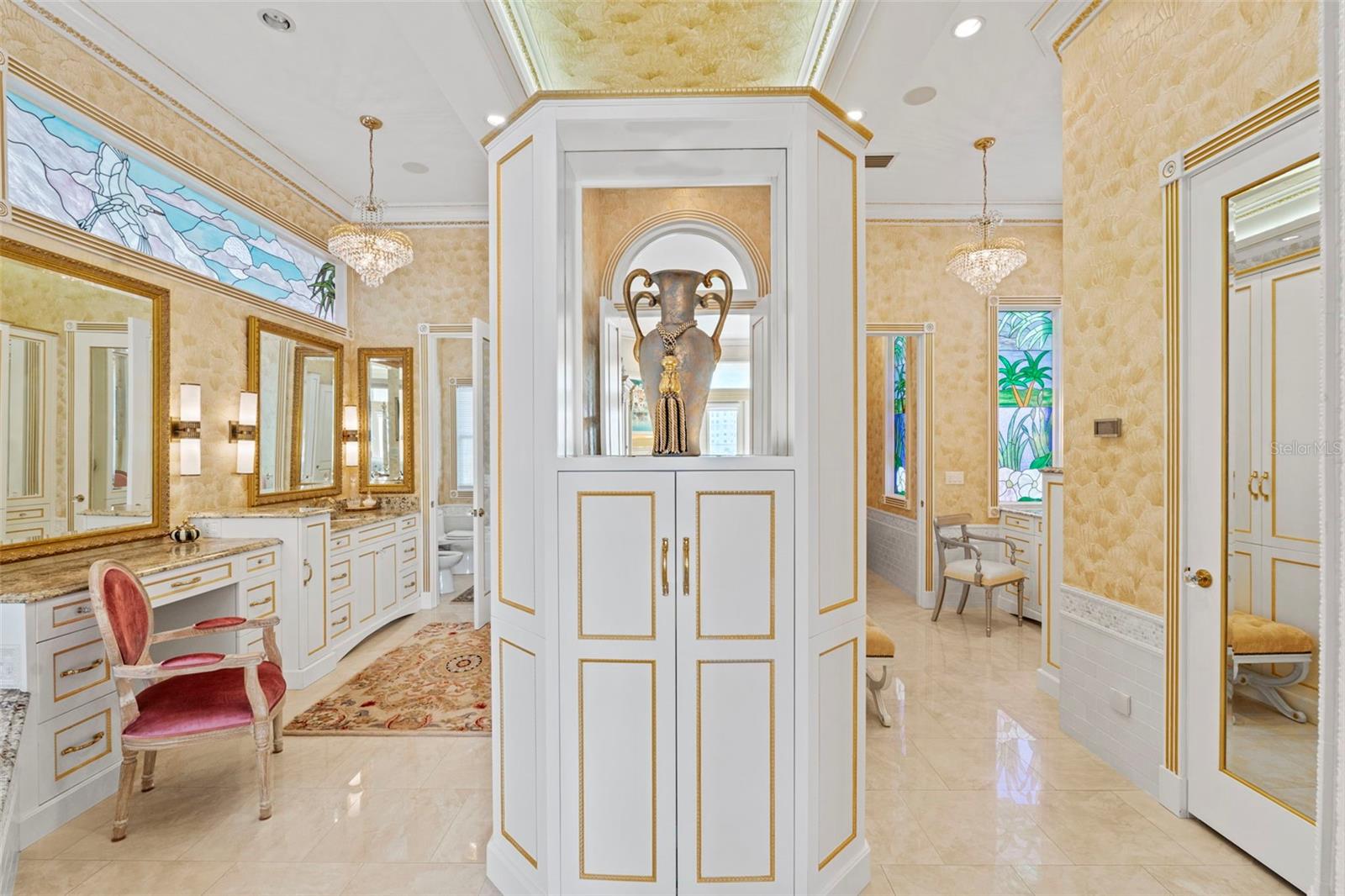 The Master Bath has Separate Vanities, Water Closets, Wardrobes and Walk in Closets!