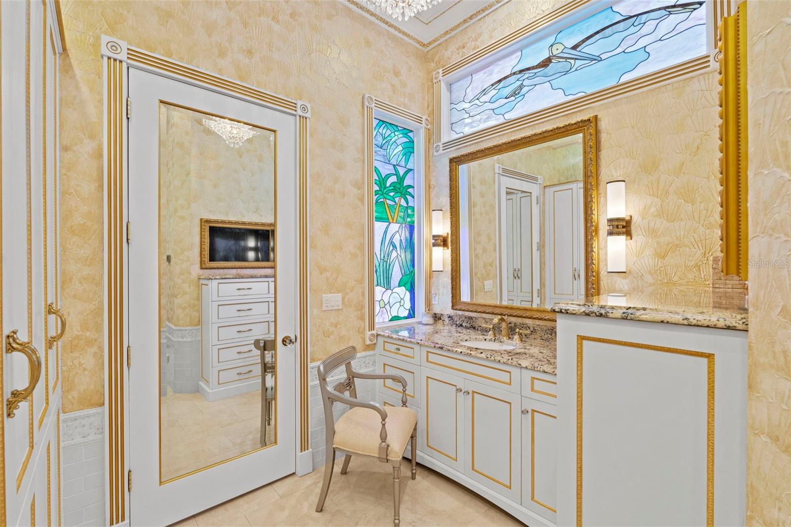 Custom Stained Glass windows over separate vanities.