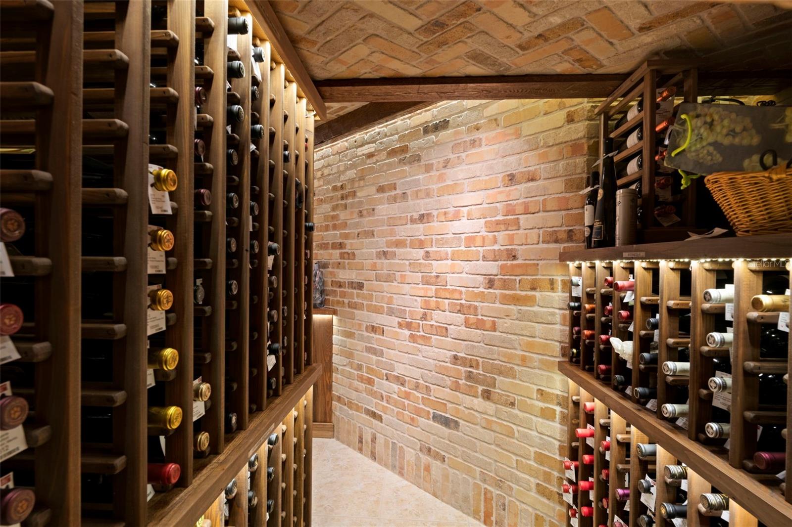 Beautiful brickwork on the walls and the ceilings are cool to the touch and a perfect backdrop for your wine collection.