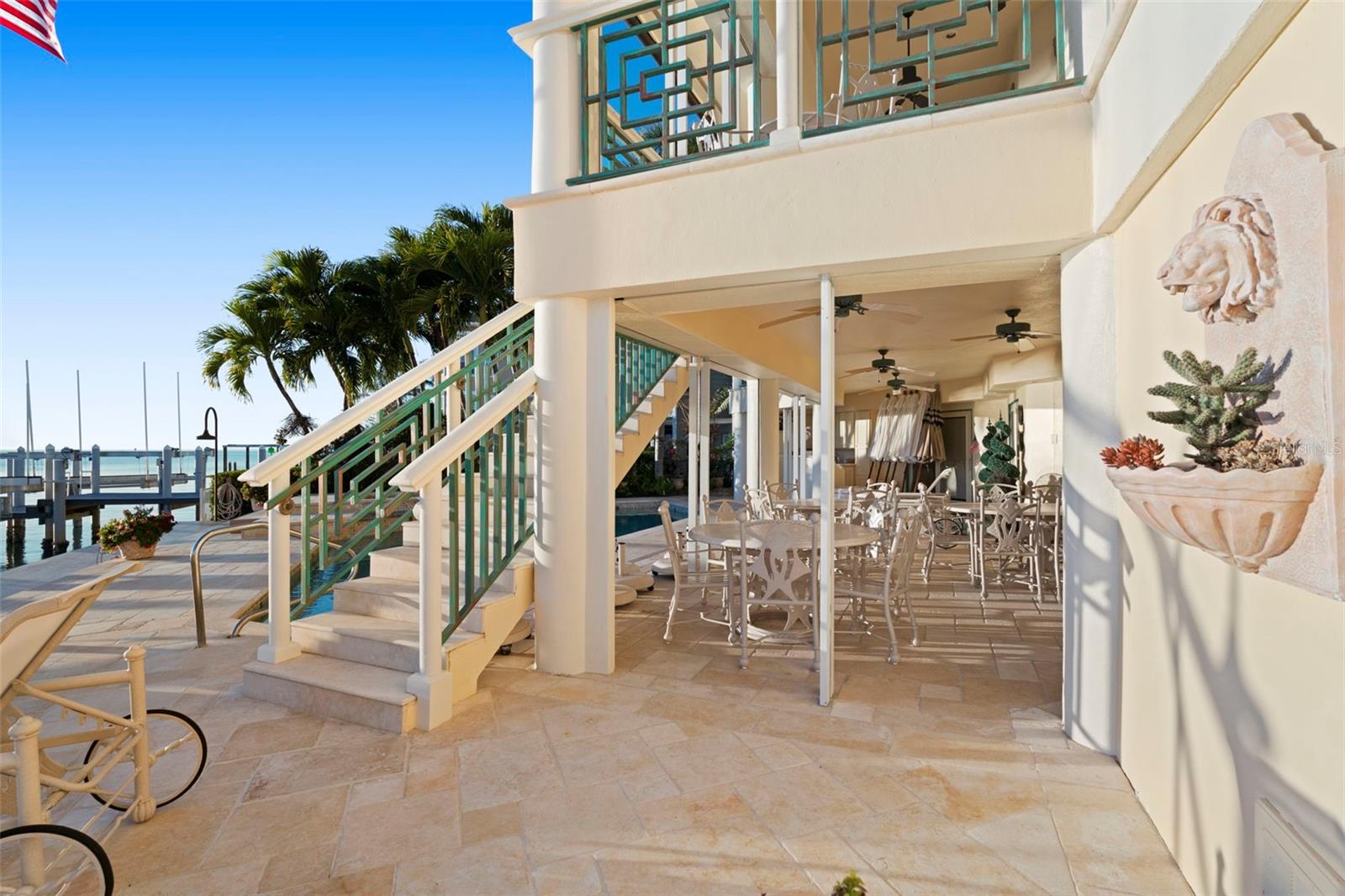 Stairs lead from the Upper Balcony to the Waterfront Lanai.