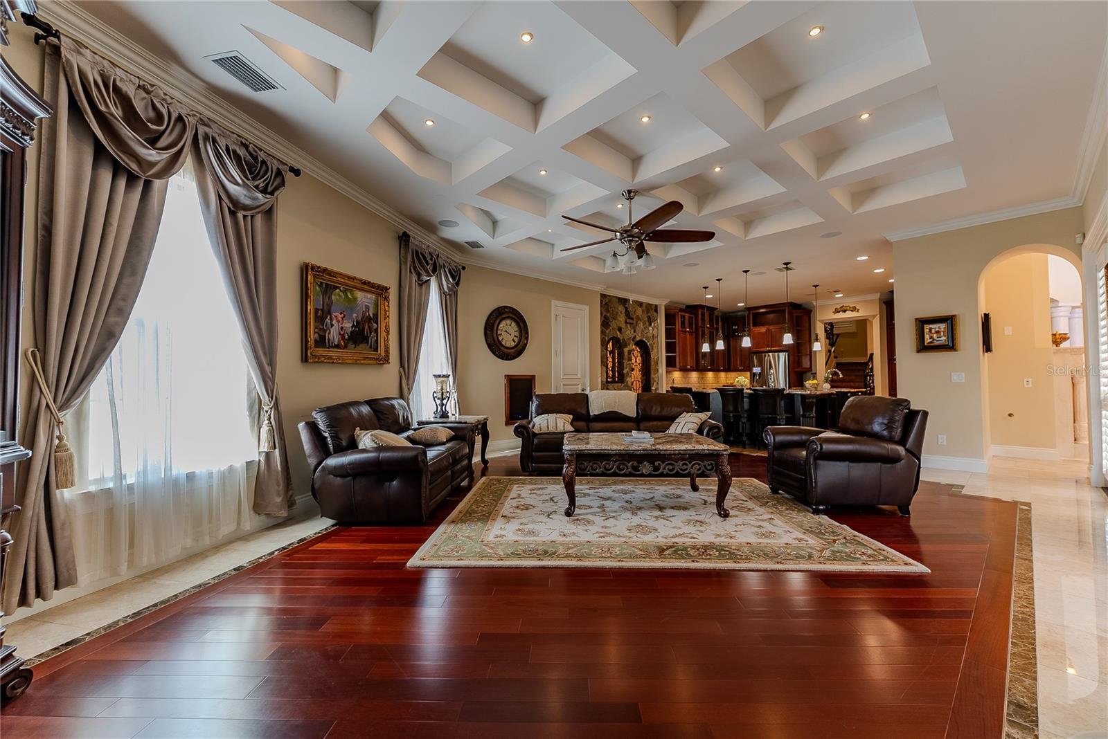 Natural light and architectural detail define the main living area.