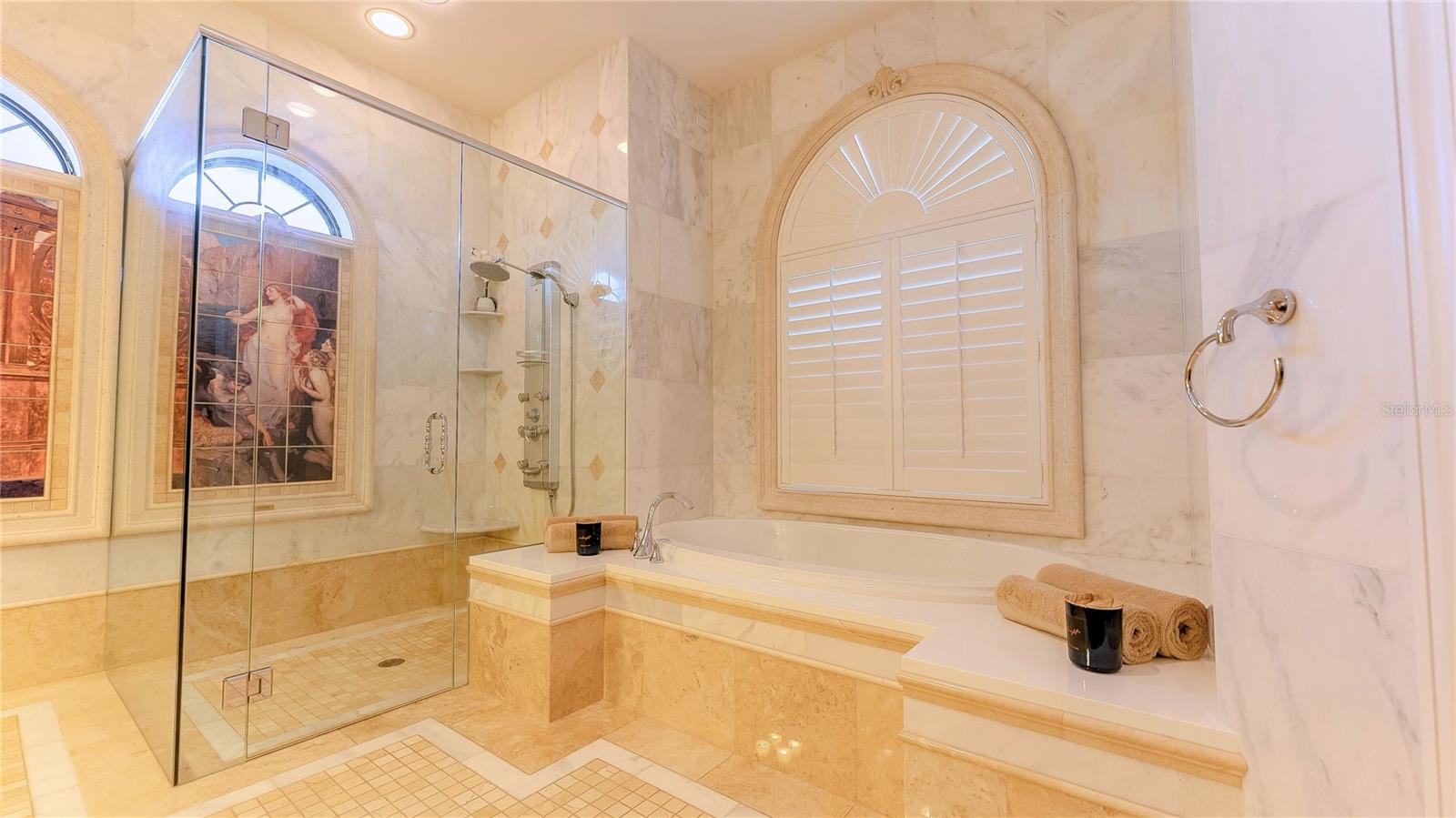 Spa-inspired bath with soaking tub and elegant finishes.
