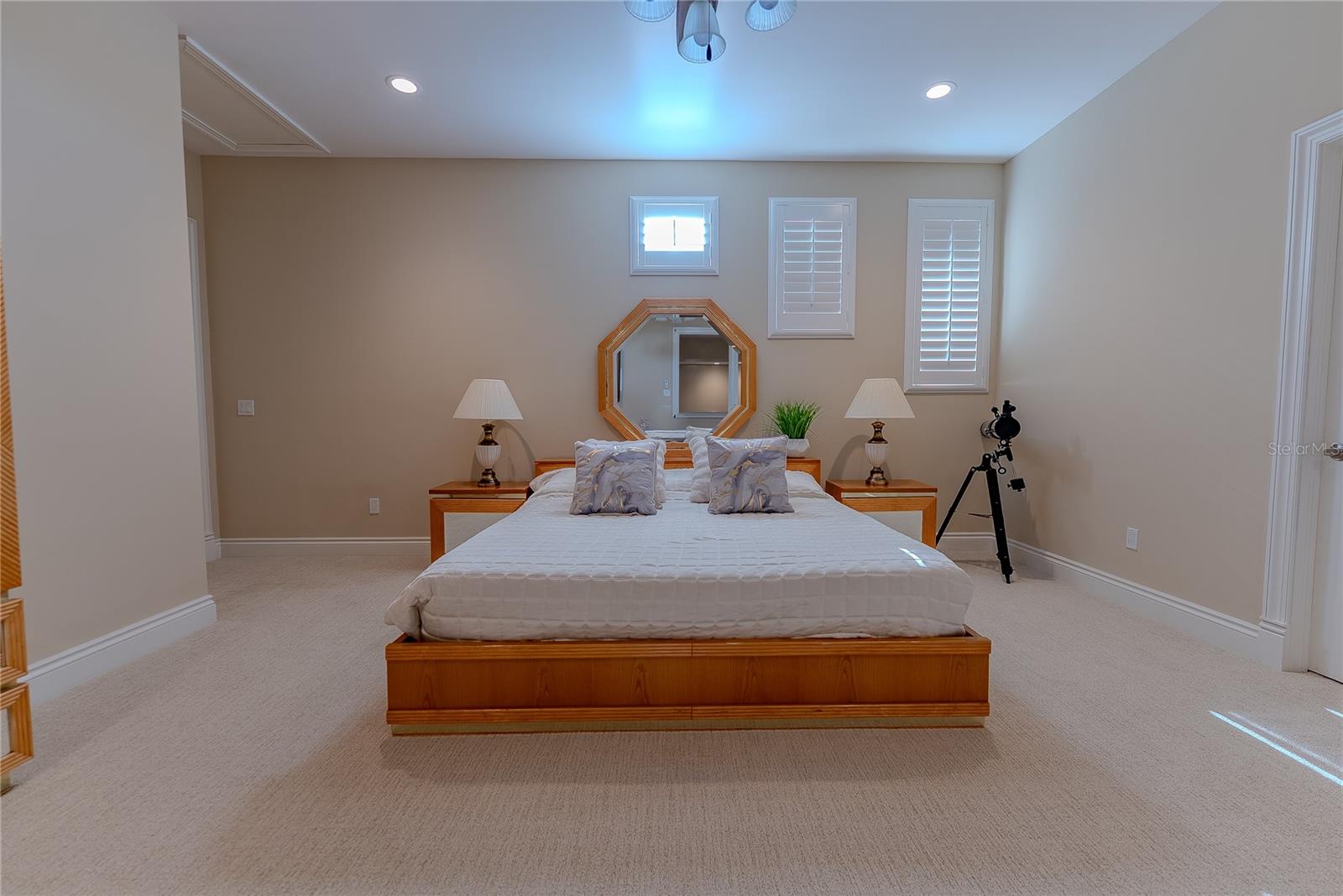 Well-appointed upstairs suite with direct balcony access and natural light