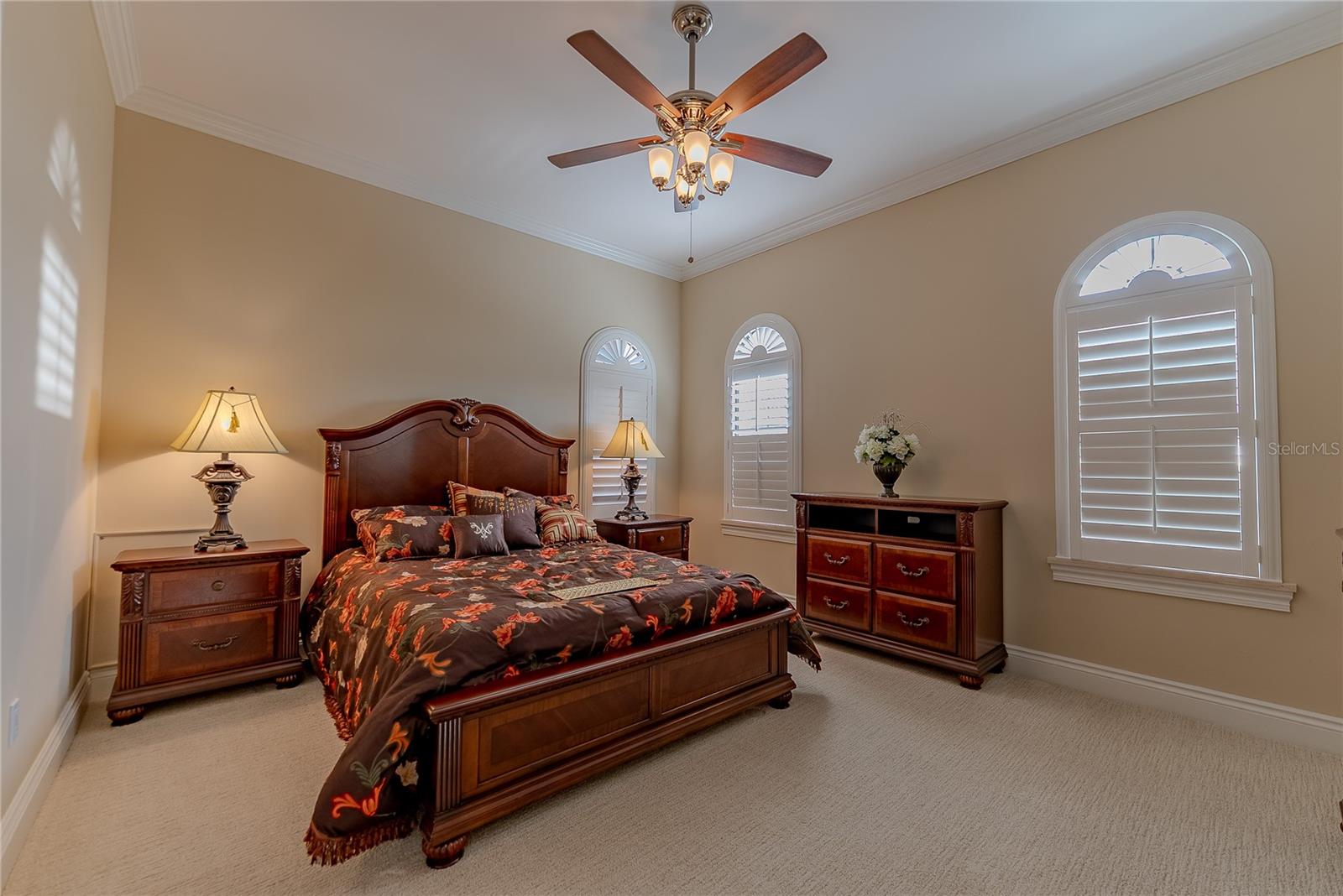 Well-proportioned upper-level bedroom designed for guest privacy.
