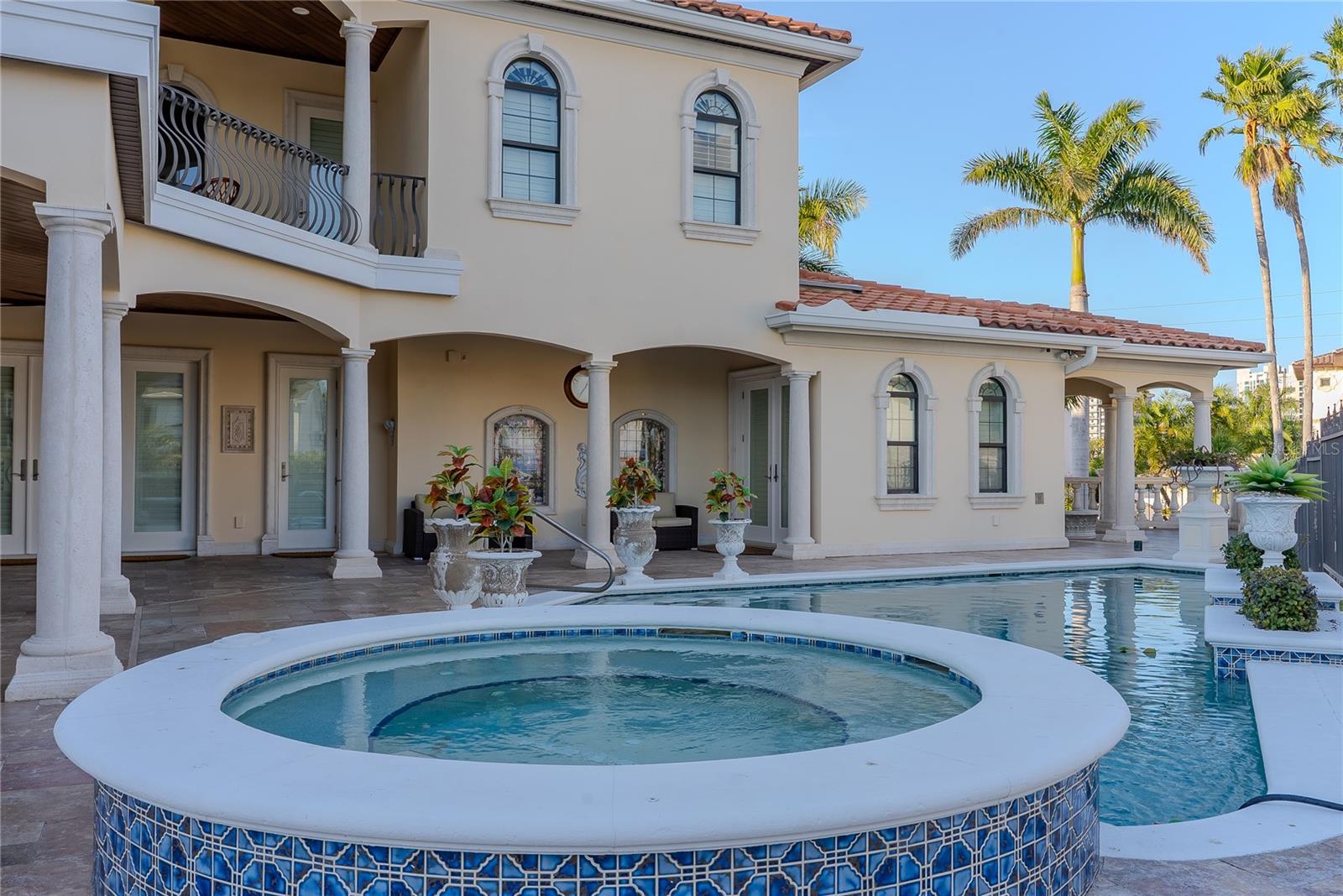Elevated spa overlooking the private pool courtyard.