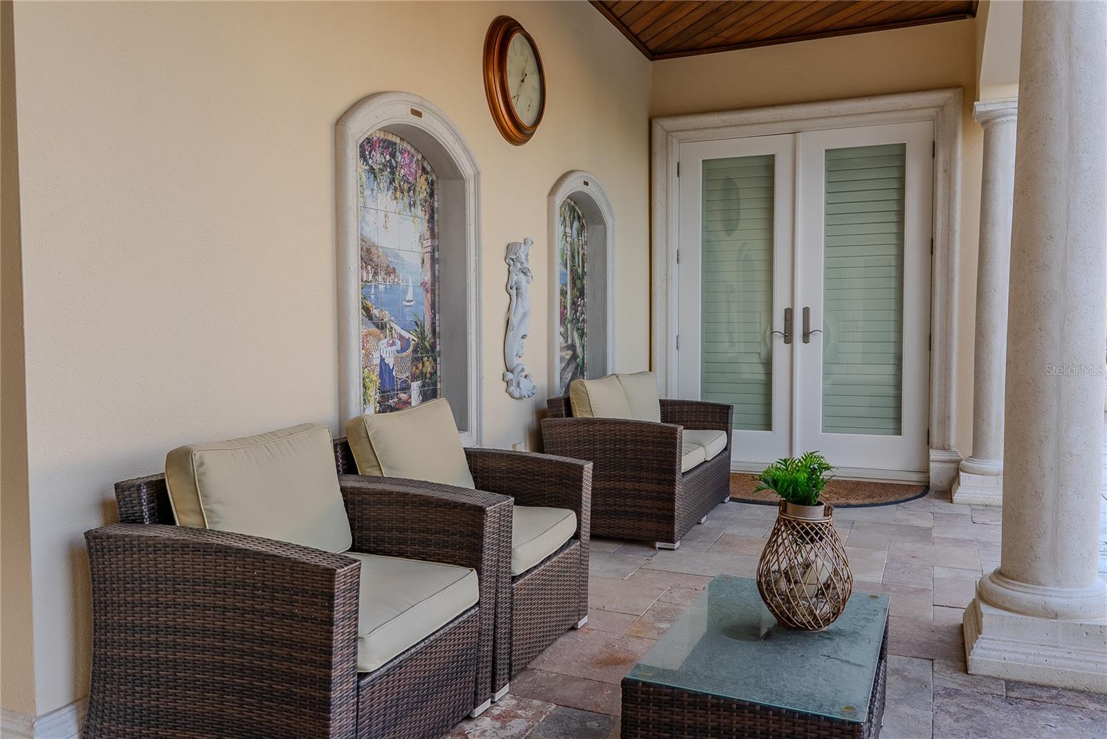 Private covered terrace accessed directly from the primary retreat.