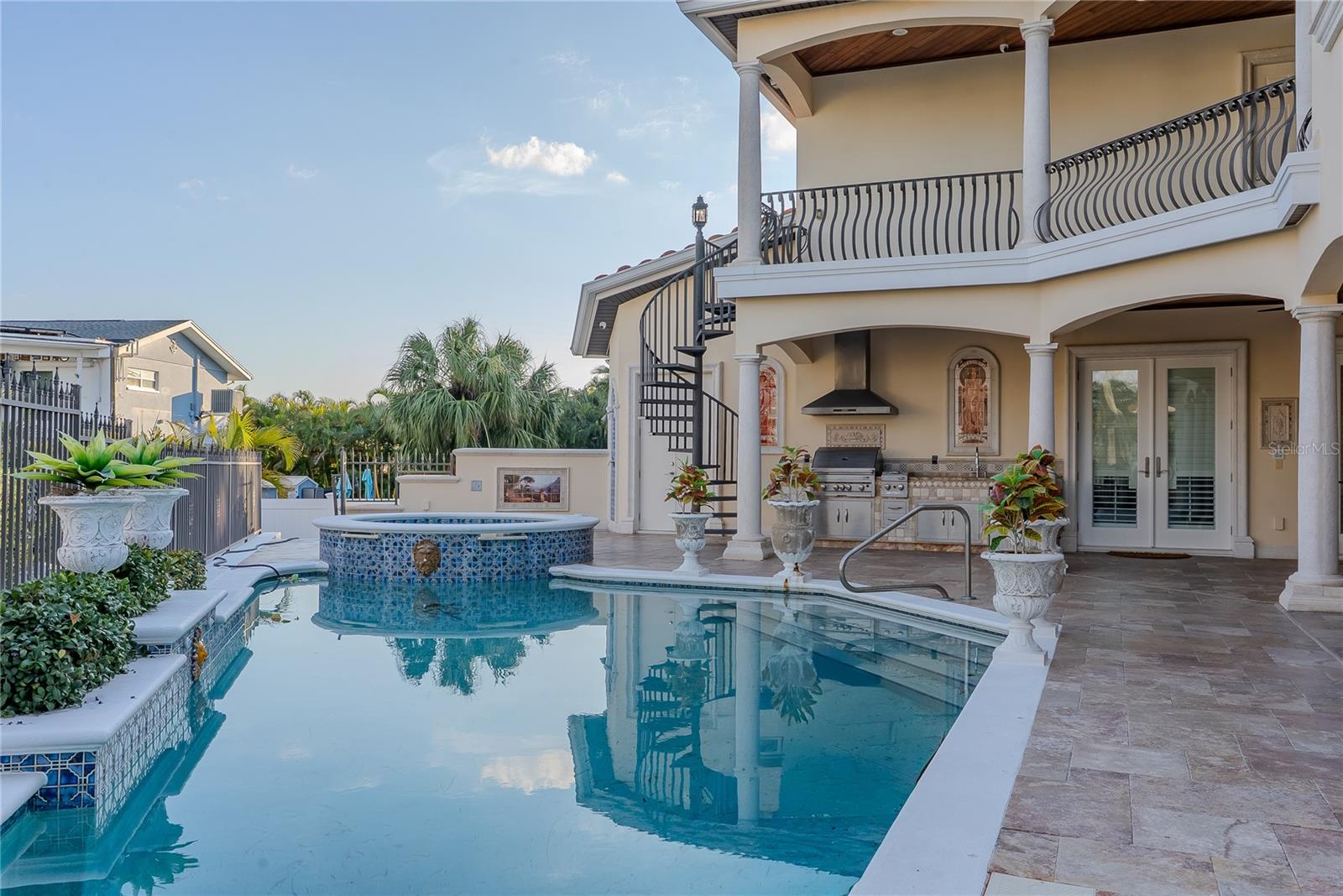Resort-style pool and elevated spa designed for relaxation and entertaining.