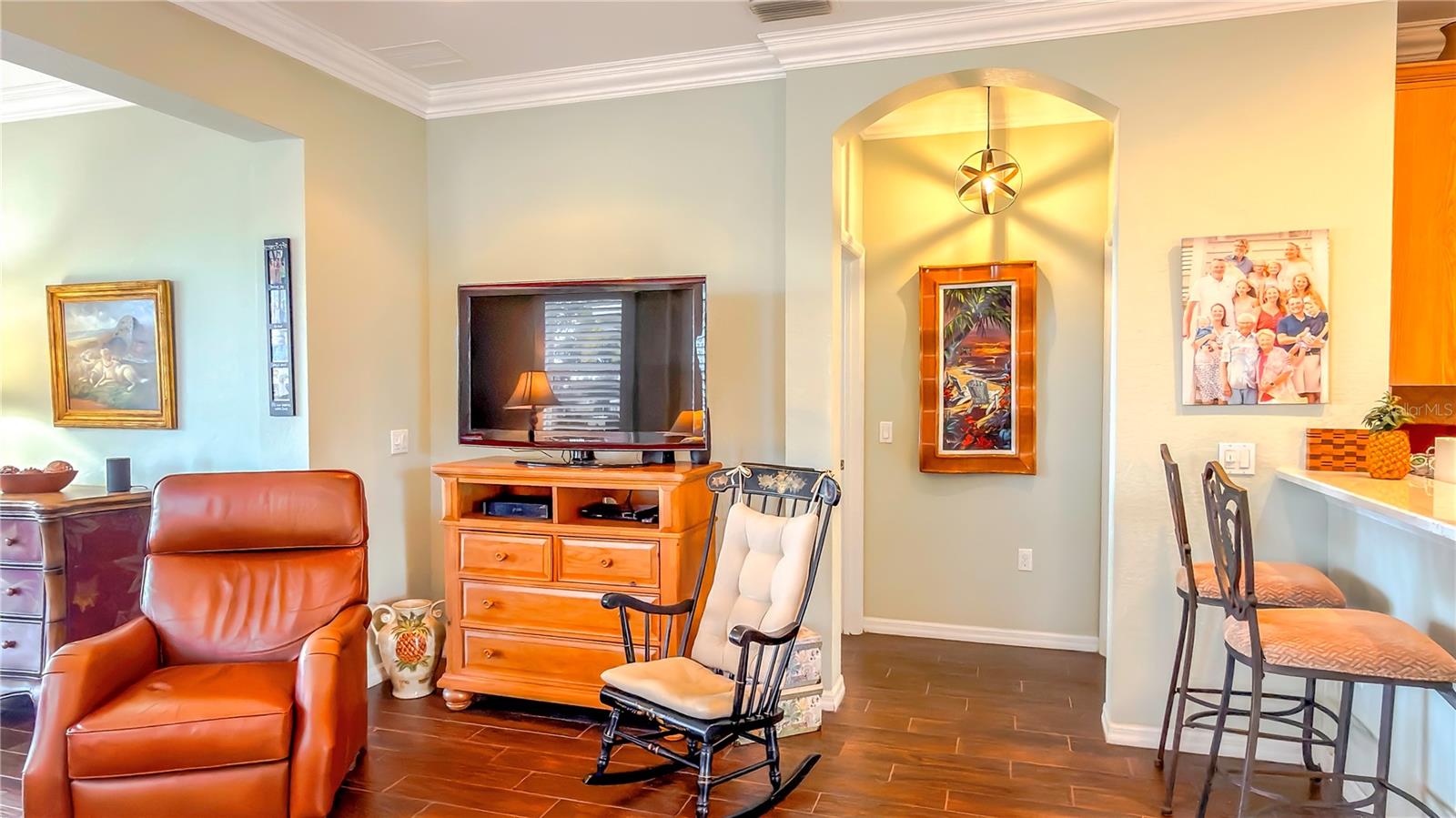 Notice the pretty alcove and lovely light fixture.