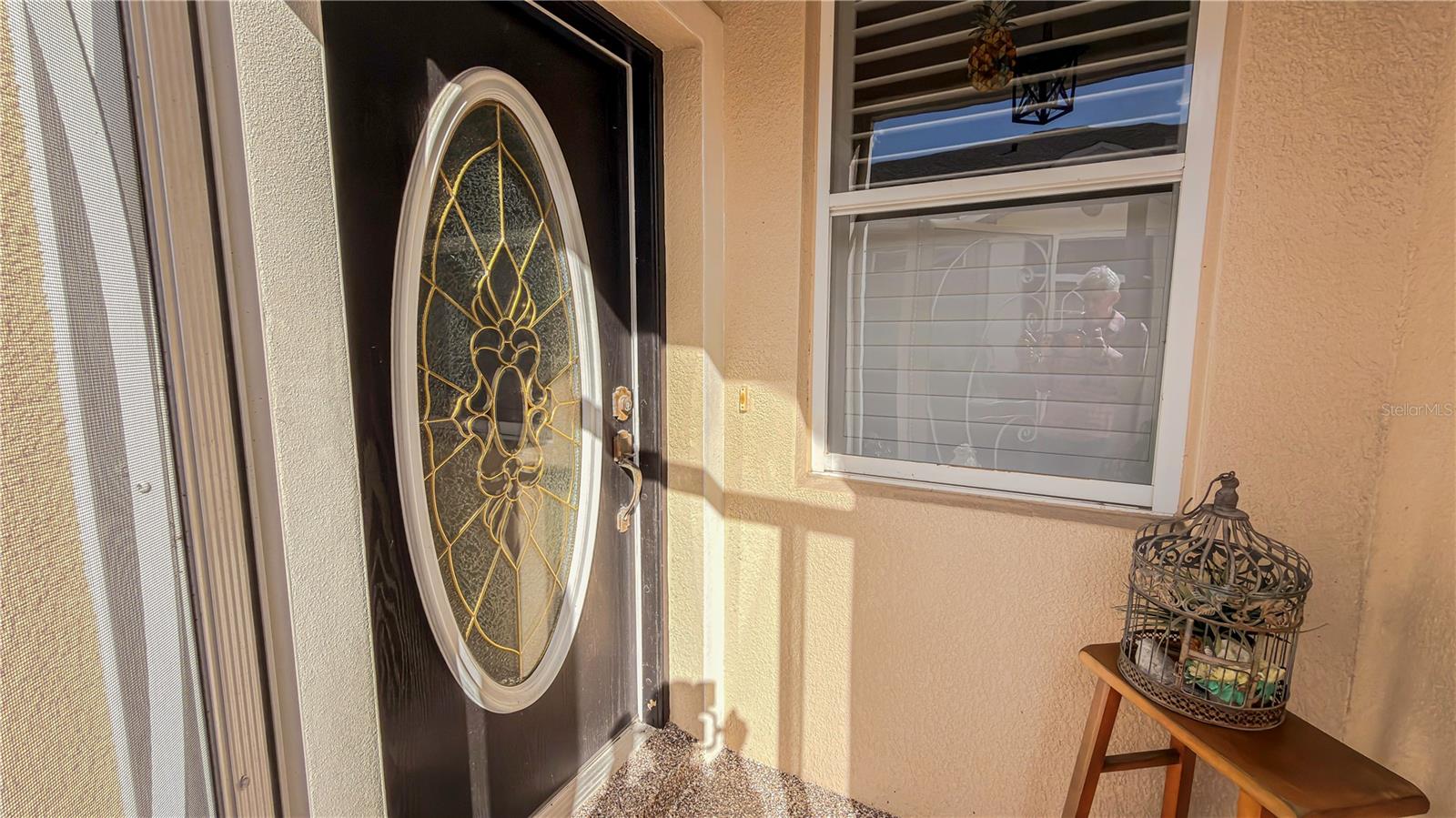 Front entry with leaded glass front door.