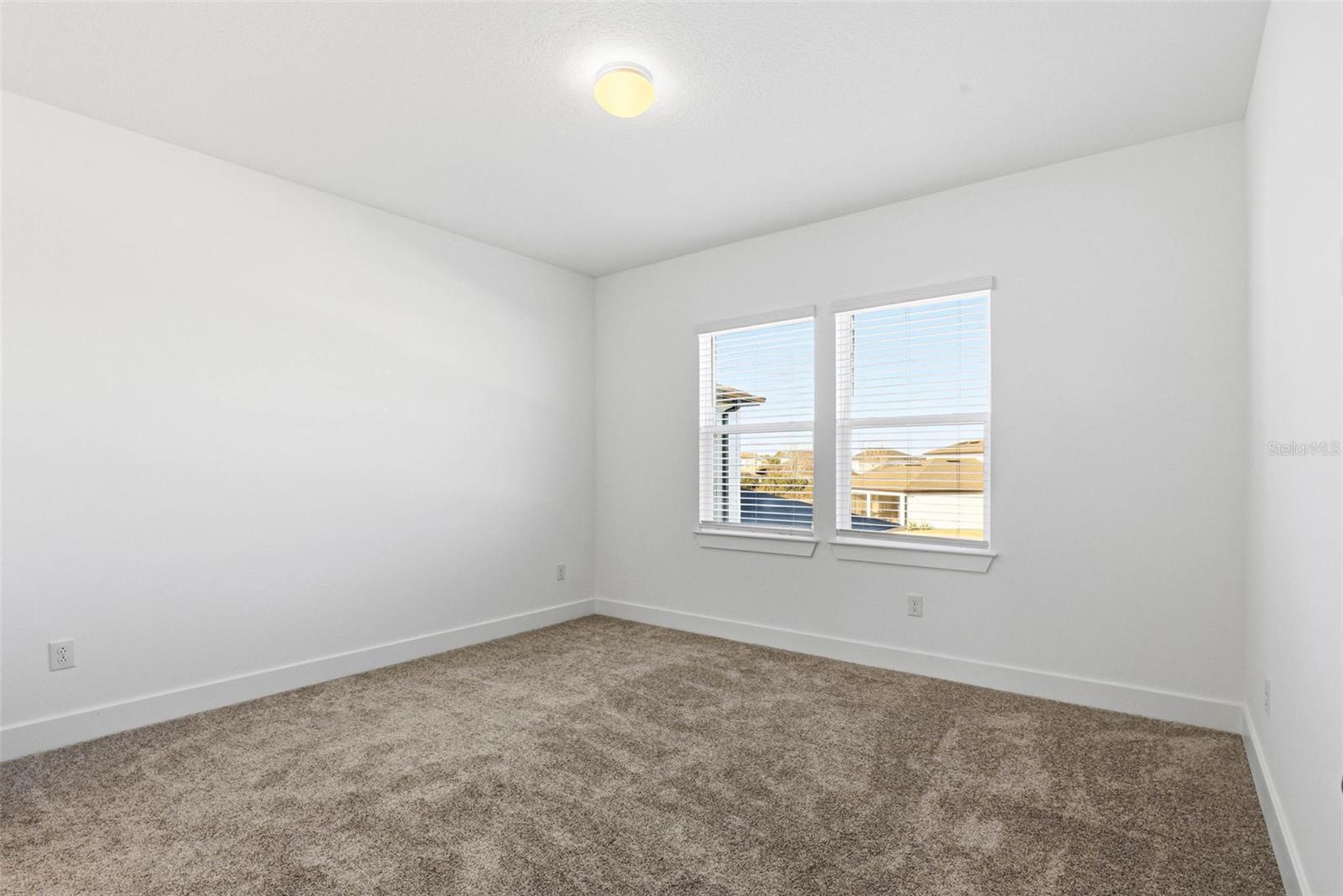 BEDROOM 2 W/ JACK & JILL BATH