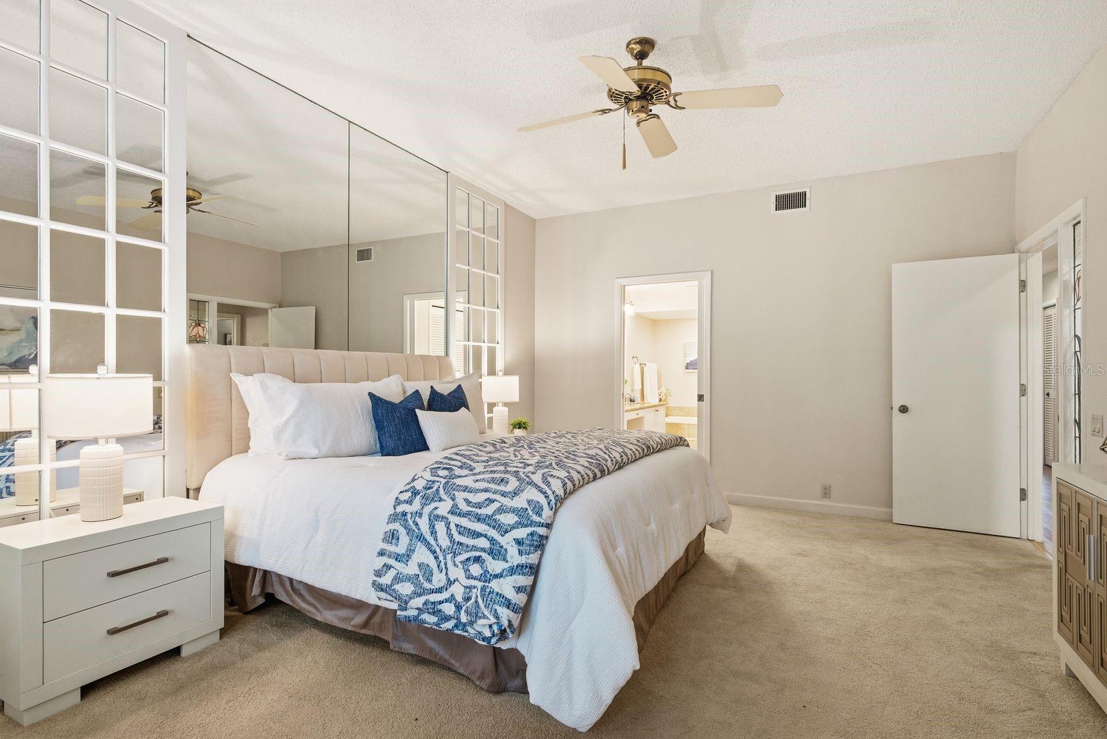 Oversized Primary bedroom with seating area