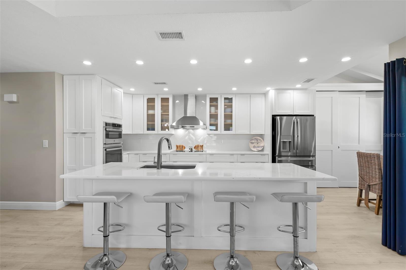 Beautifully Updated Kitchen opening up to 2nd level living room