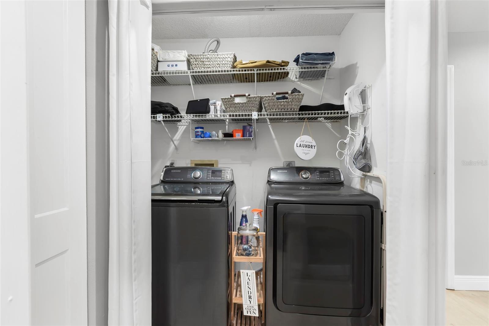 Convenient inside Laundry Room near guest rooms/bathroom.