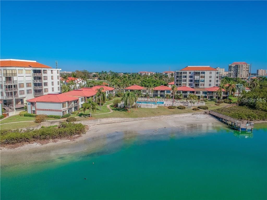 Enjoy stunning, unobstructed water views of the bay and easy access to an awesome fishing pier!
