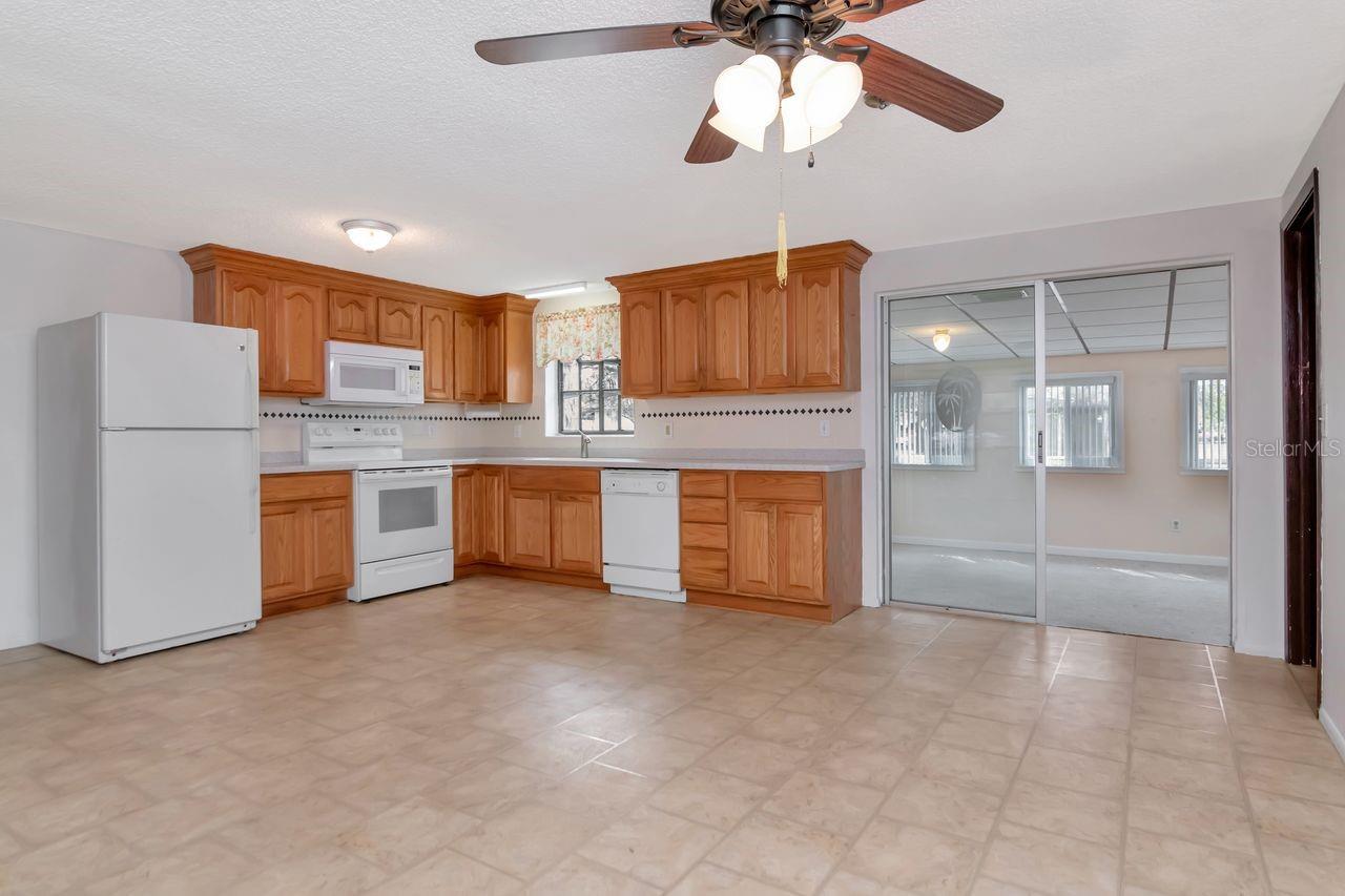 Spacious, well maintained Kitchen. Sliders lead to Florida Room