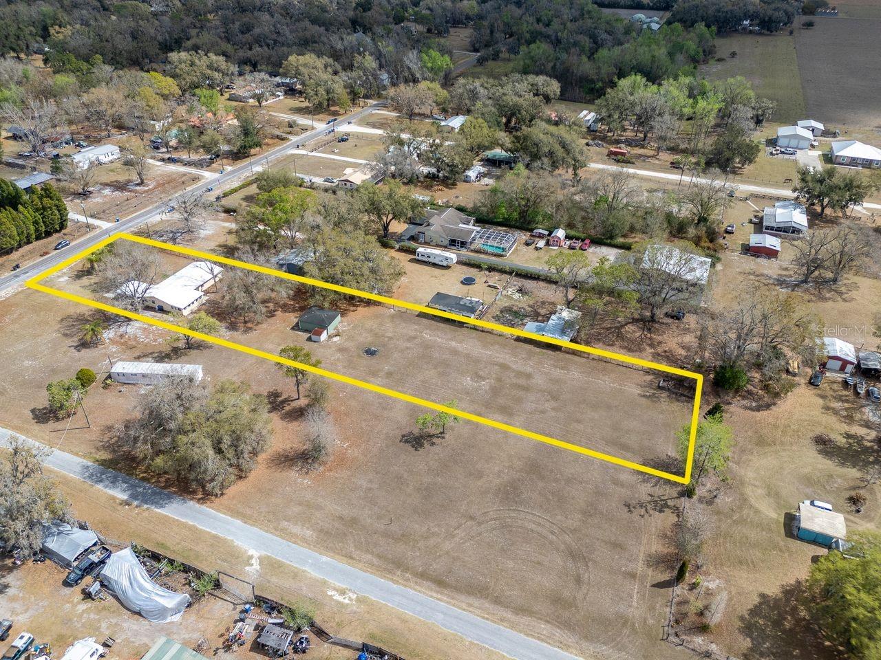 1.19 Acres - 4/2 with a workshop and a shed