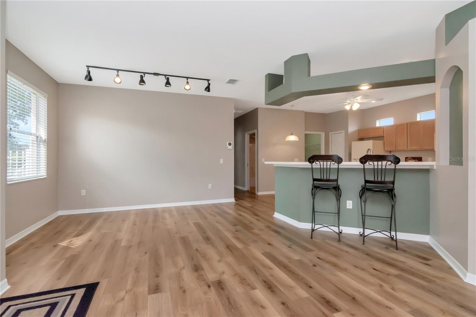 Open dining space with convenient breakfast bar