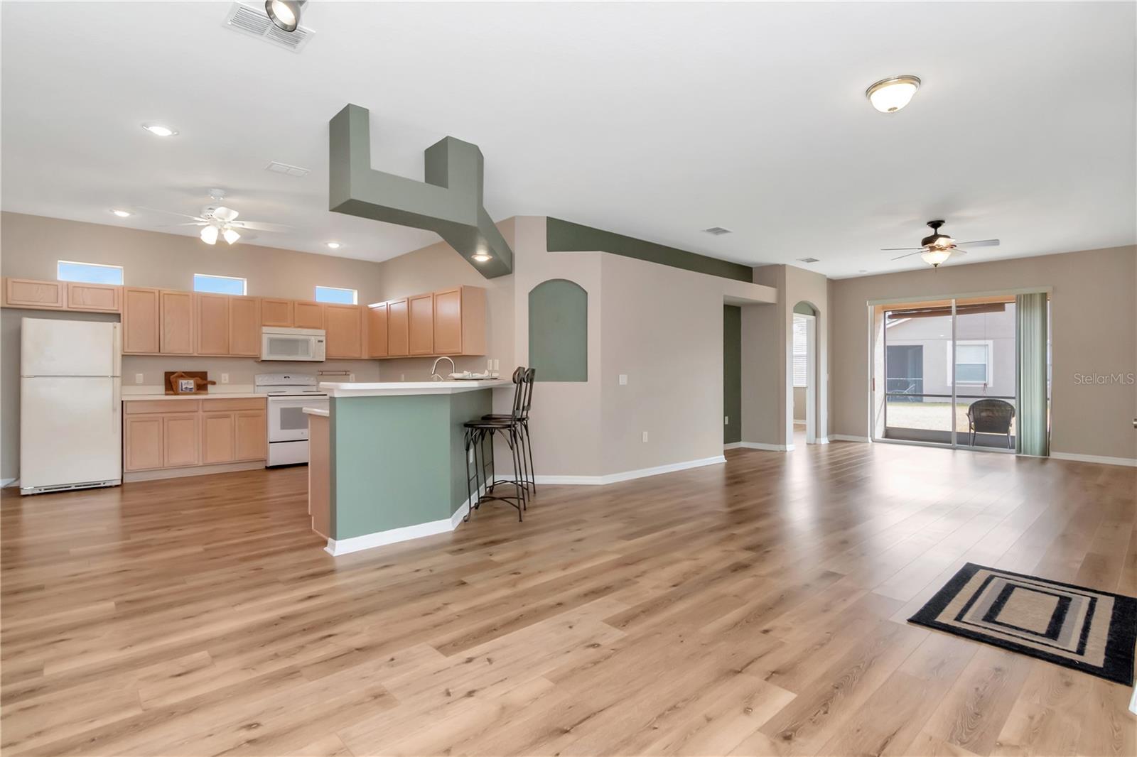 Open dining space with convenient breakfast bar