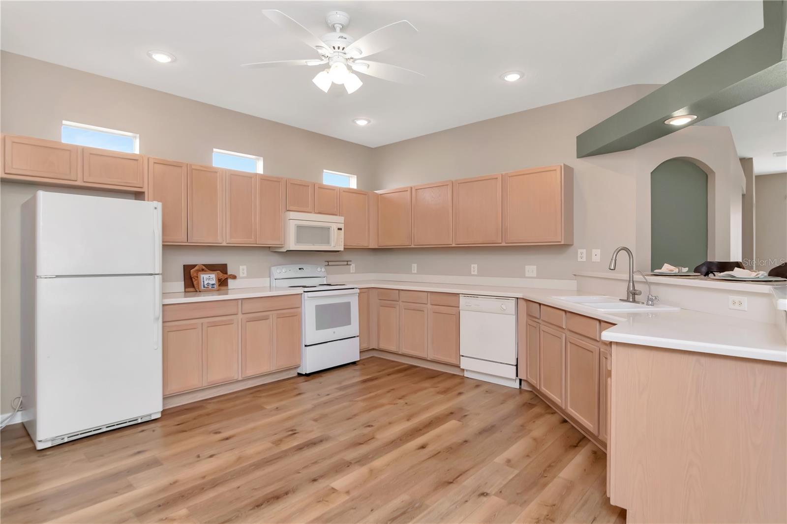 Spacious kitchen with ample counter space and storage.
