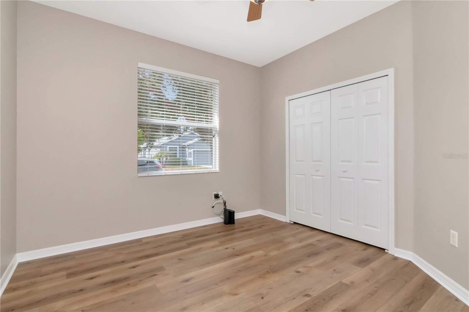 Versatile second bedroom perfect for guests or home office.