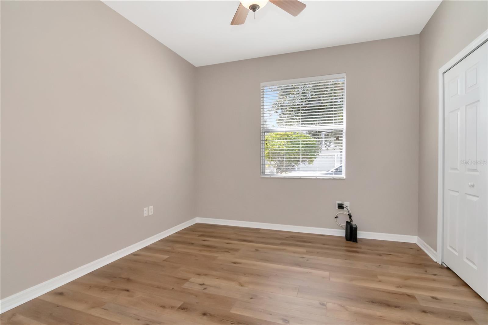 Versatile second bedroom perfect for guests or home office.