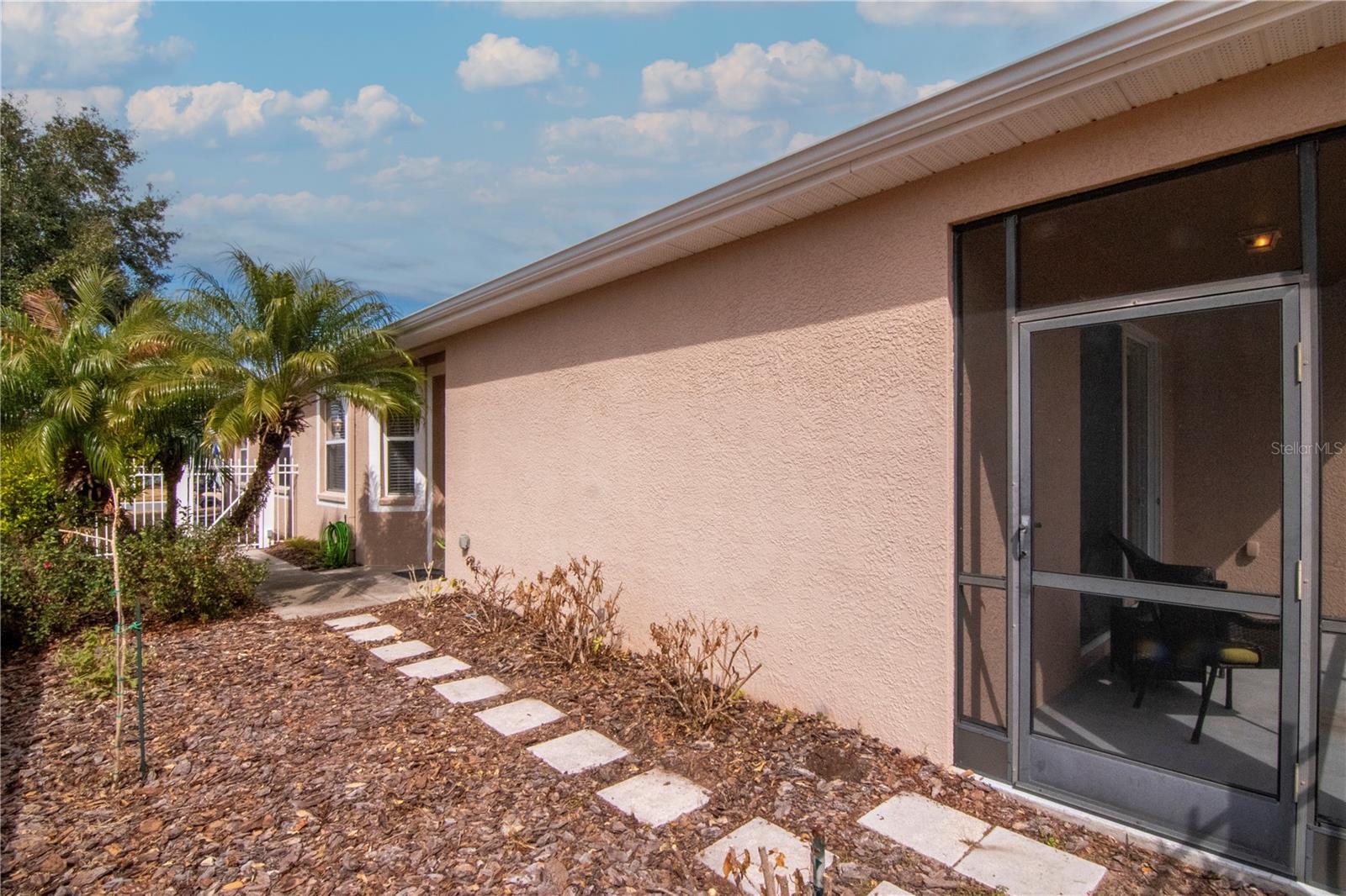 Private rear courtyard with convenient access to the lanai.