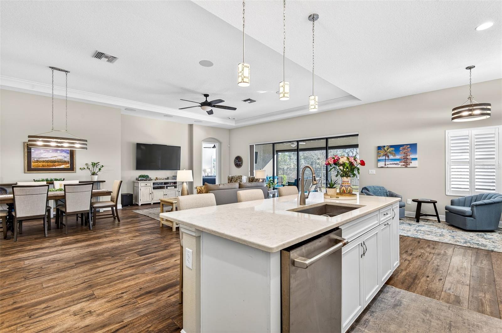 Kitchen overlooks great room and dining room