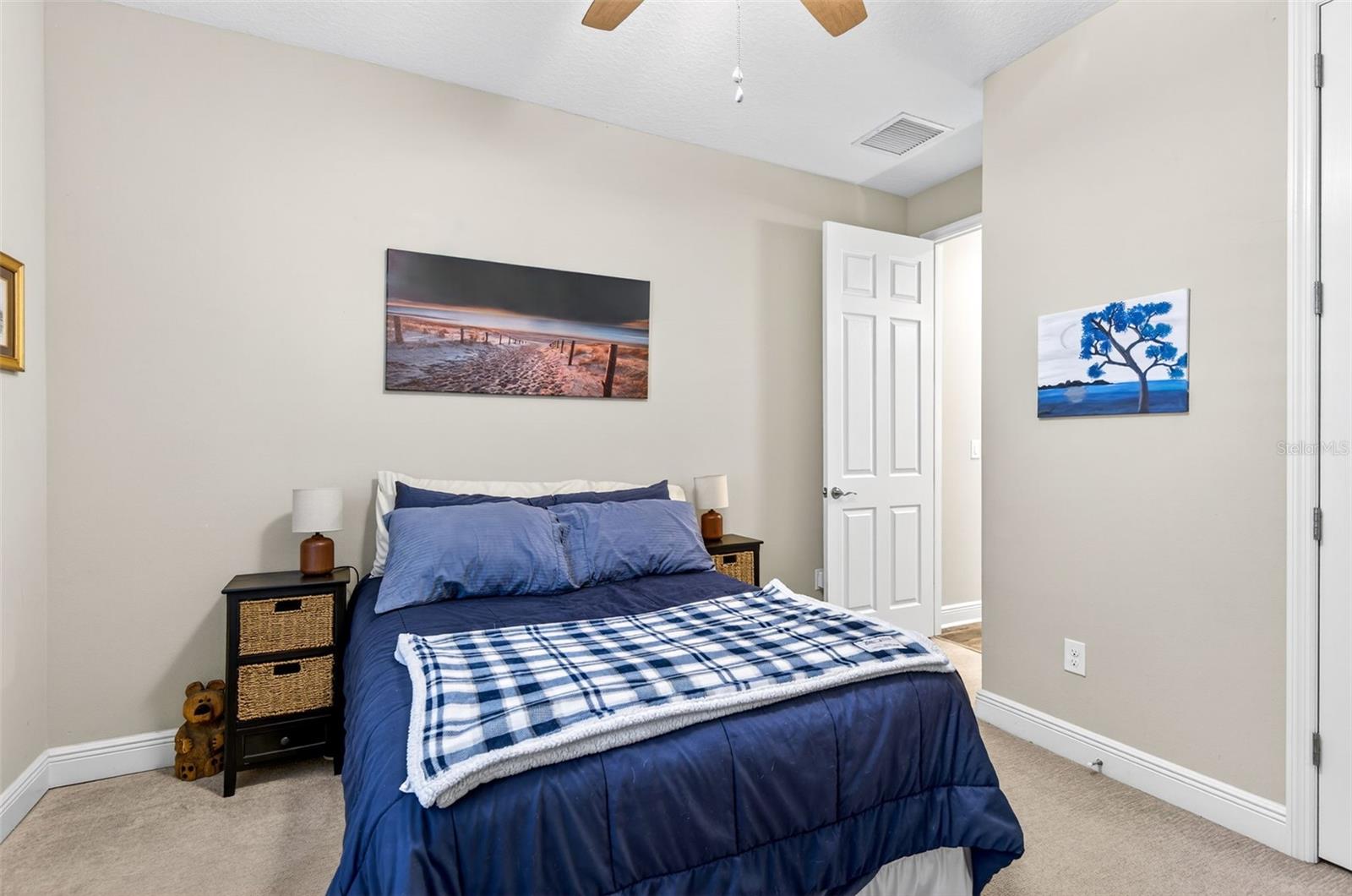 Bedroom #2 with bathroom located just outside of the room. Built in closet