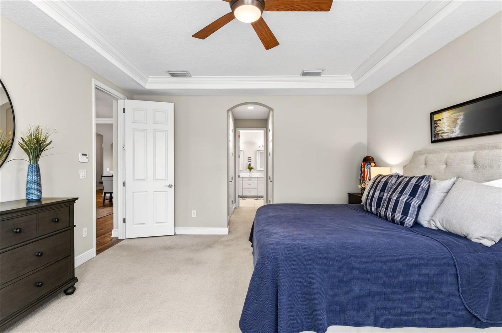 Primary bedroom with en suite bathroom and two closets