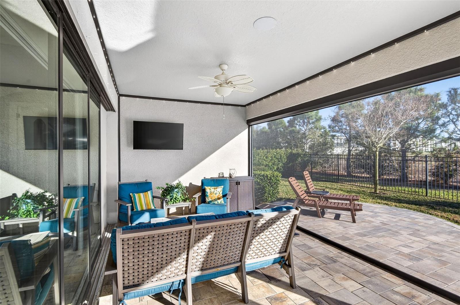 Covered lanai with remote control screen for full exposure if desired. Lanai is lined with trim lights that can be changed to match your mood.