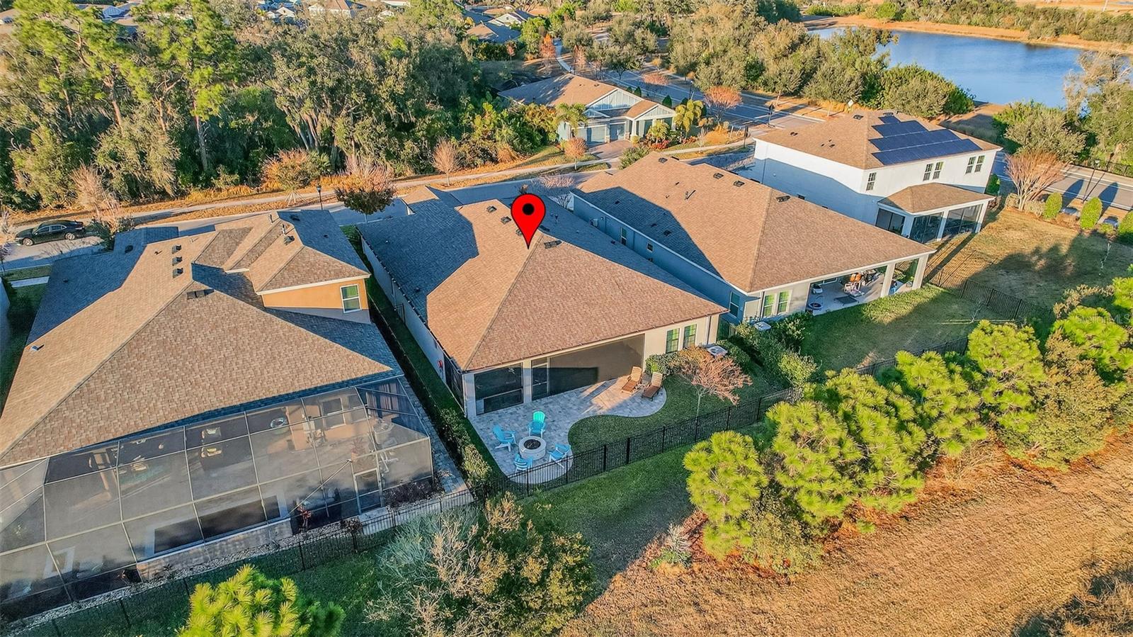 Aerial view of back yard and conservation area across the street.