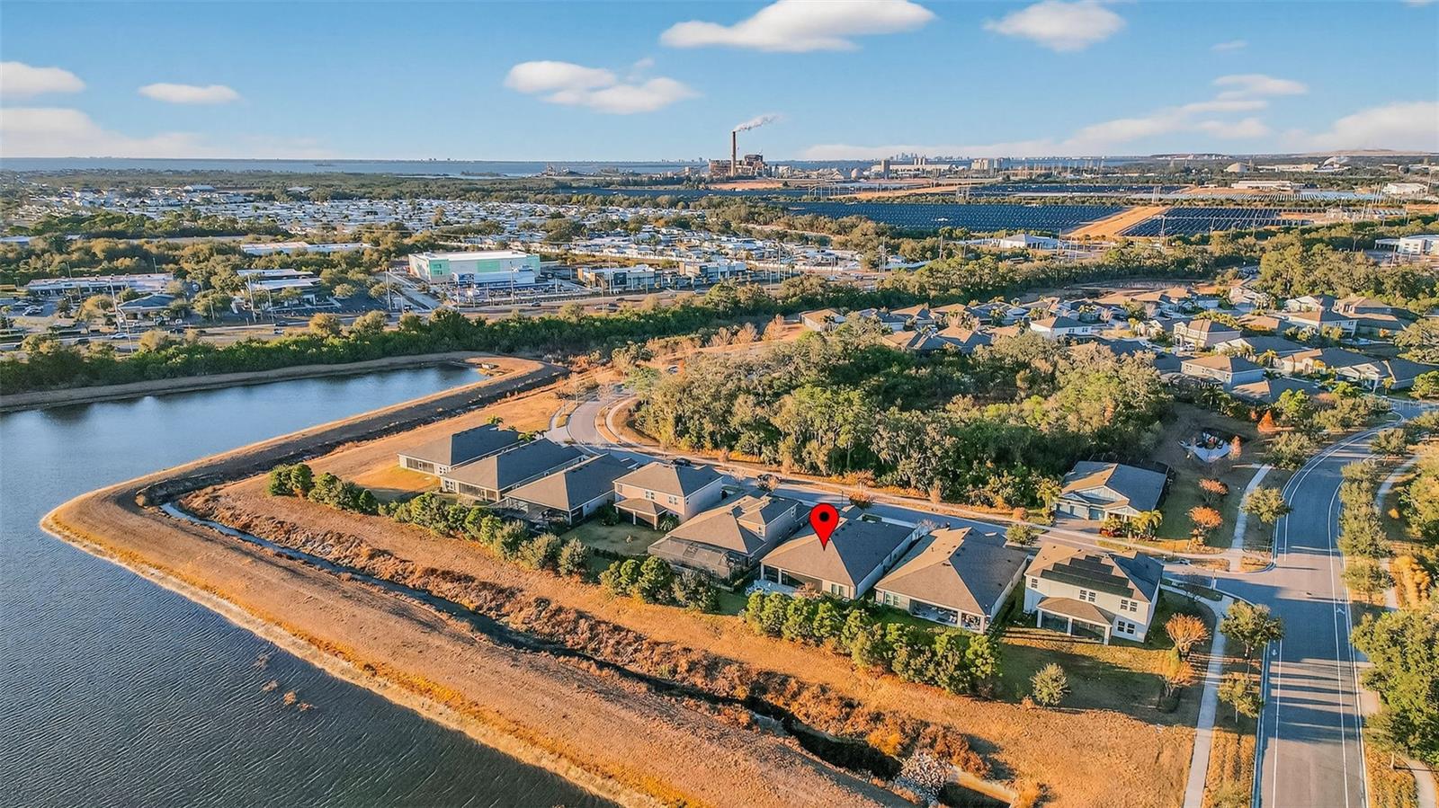 Full aerial view of pond and location of home.