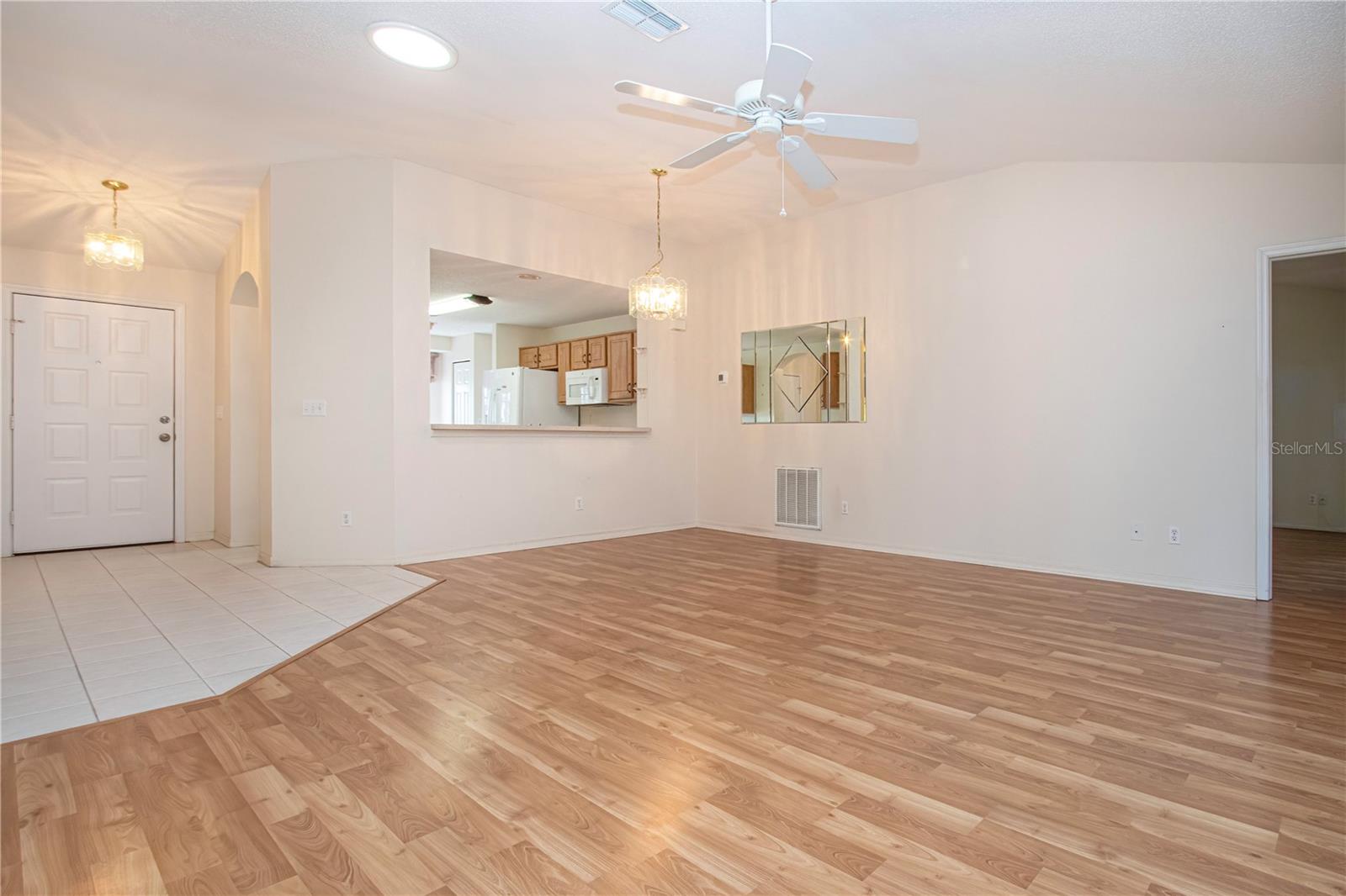Dining area with  open view of kitchen