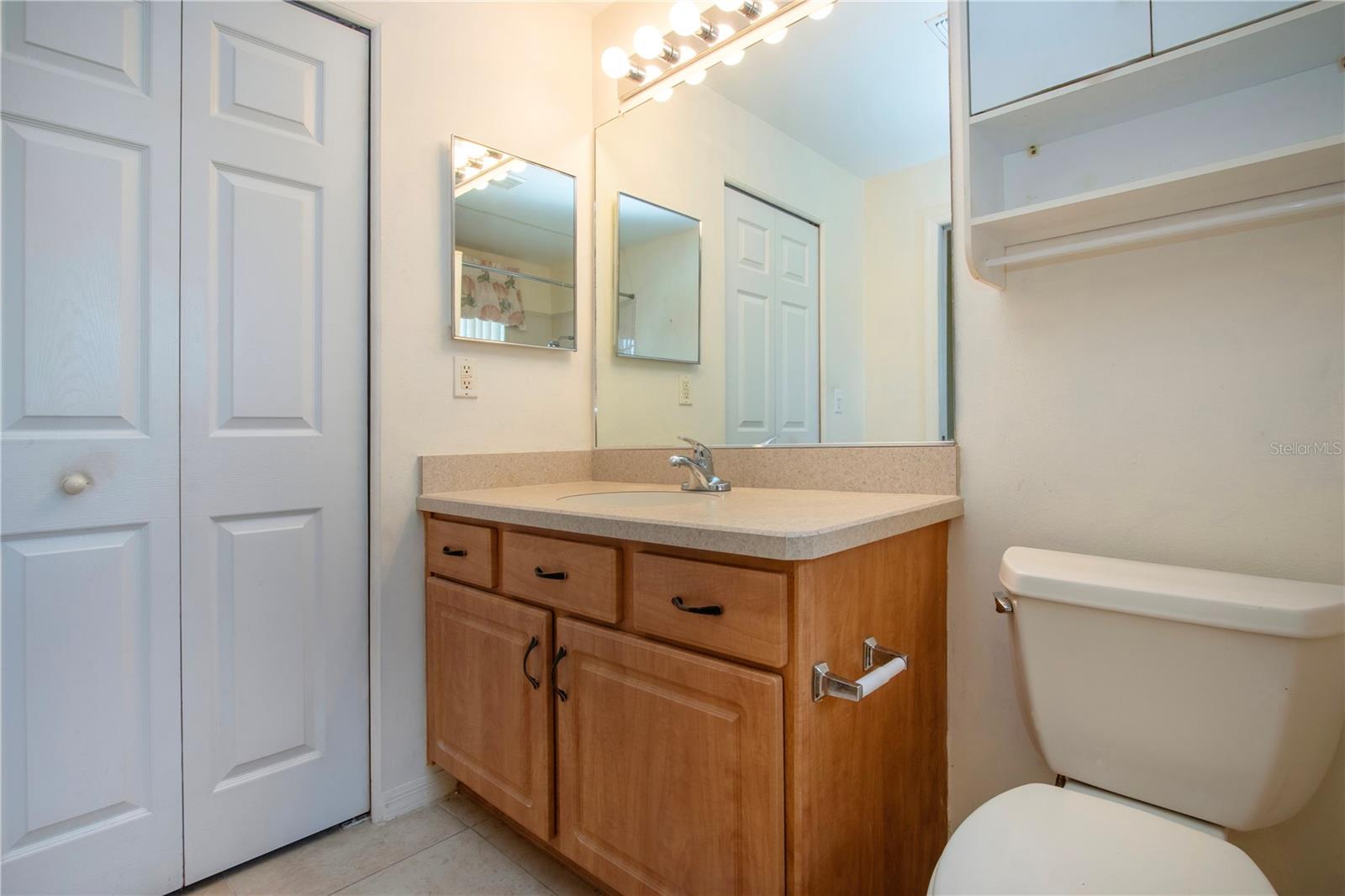 Master bath with walk-in closet