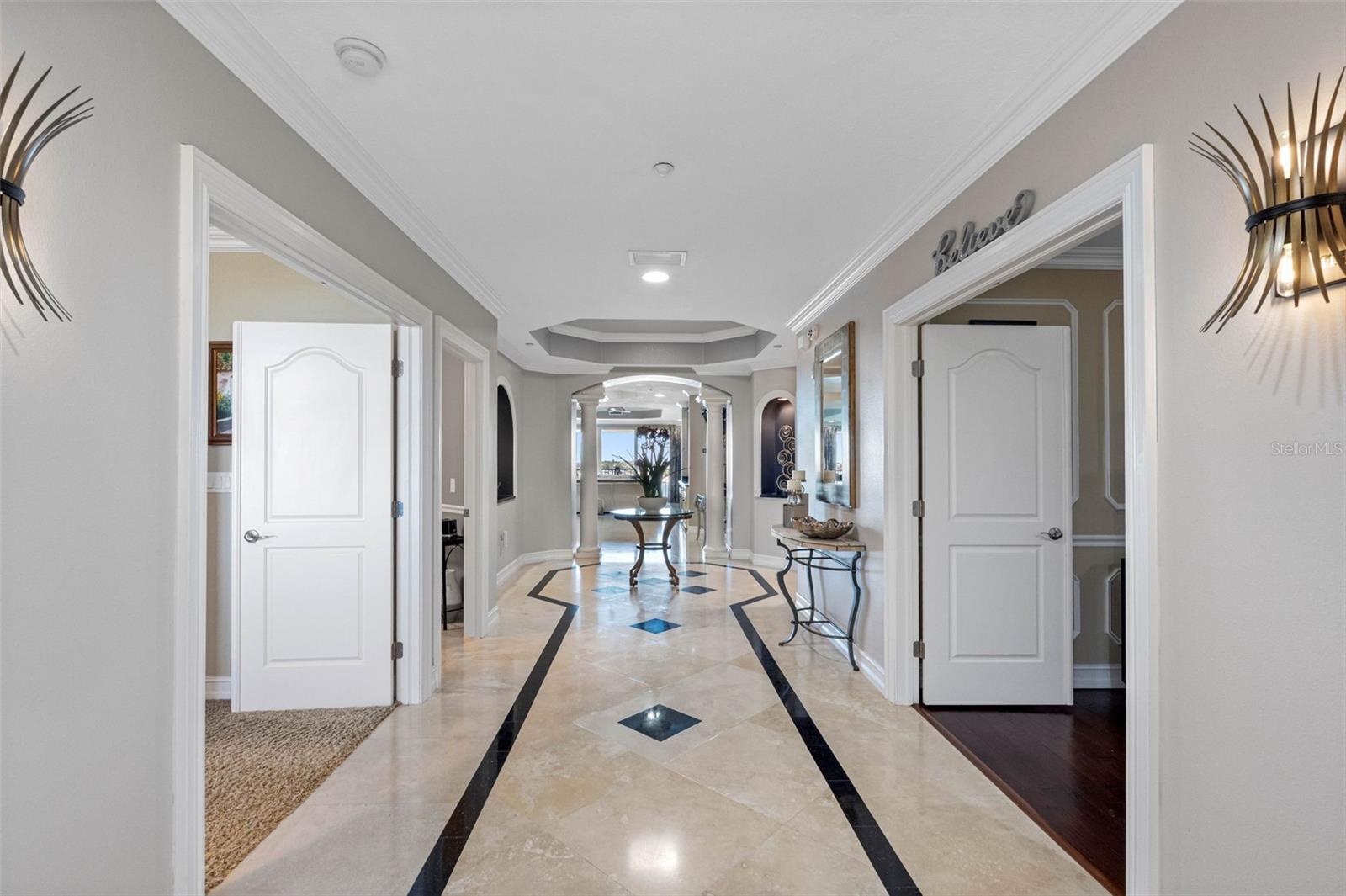 .. A 28'  Long Grand Foyer Introduces you to the Main Part of the Penthouse. NOTE: A comparable Unit Across The Street Would Value out at $4 Million. That's Without  24/7 Gated And Guarded Entrance, Clubhouse, Gym Facility, Boat Slips And Dog Walk.