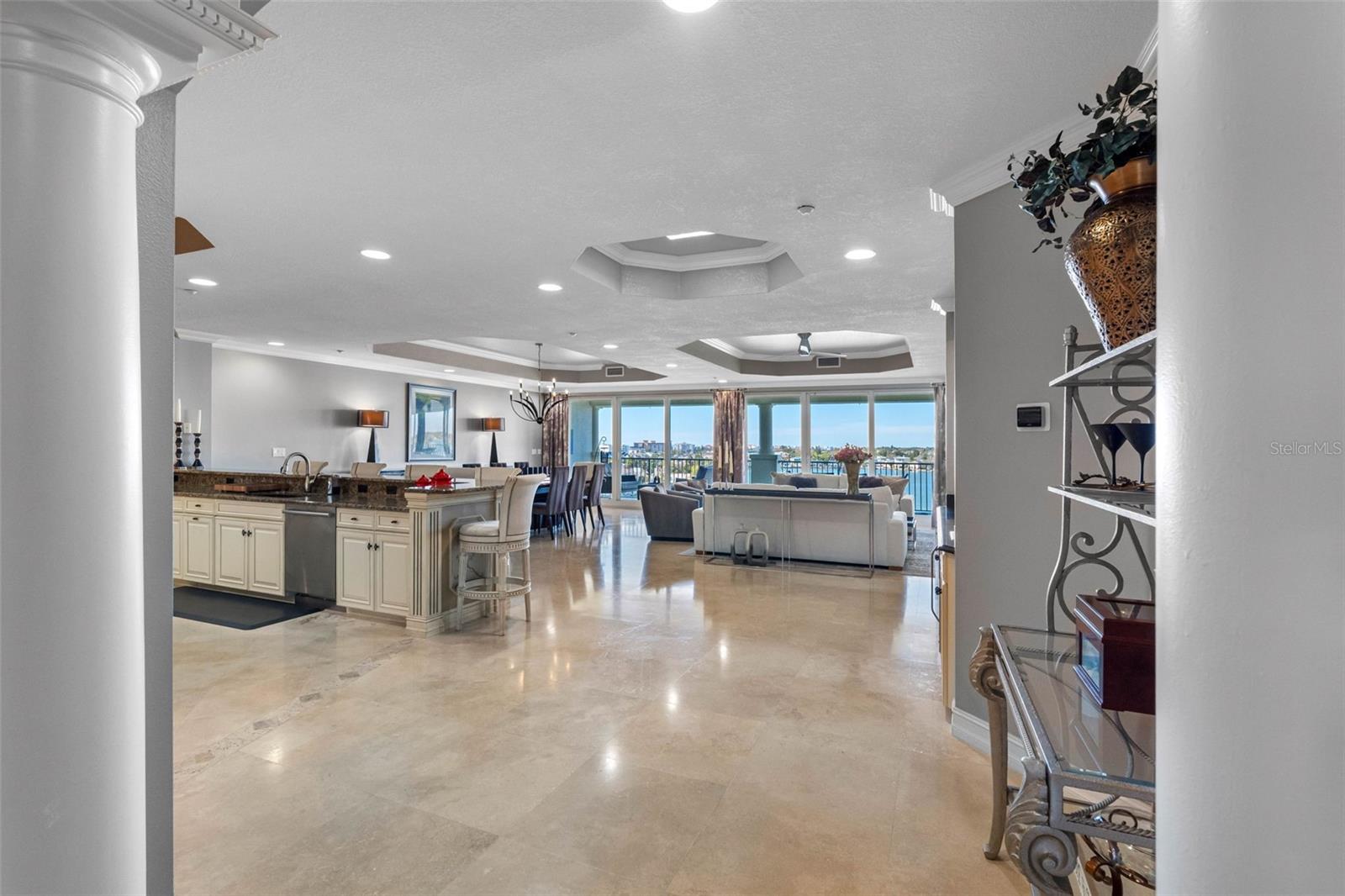 ...The 24" Travertine Marble Flooring Flows  Into The Great Room.  NOTE: Hexagon Skylight  - The Perfect Night Lite. The Camera Doesn't Capture The Feeling You Have Upon Entering The 1250 Sq Ft Greatroom. It's Awesome, A Feast For The Eyes. An Executive Waterfront Penthouse.