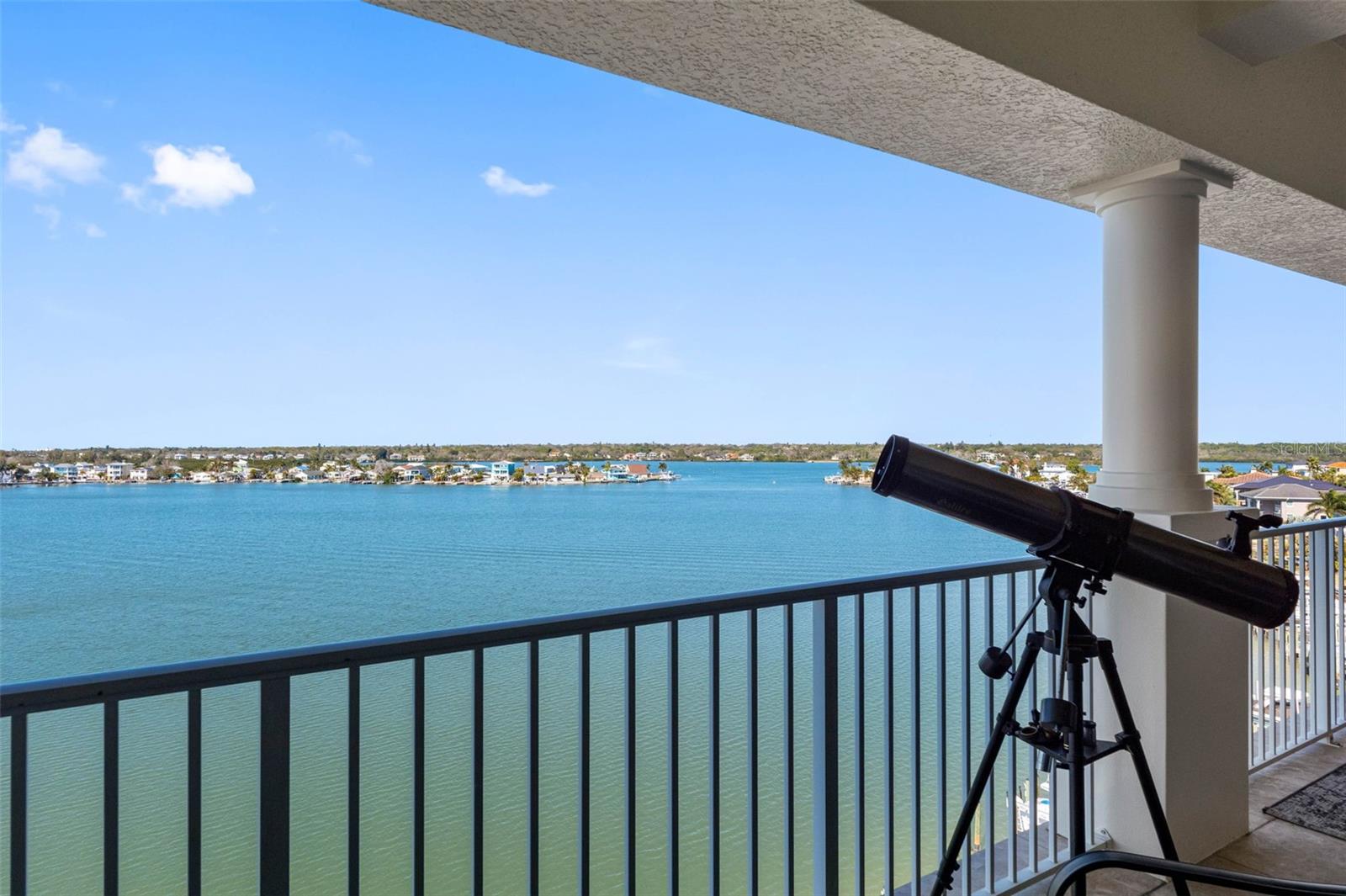 ...Terrace Looking Towards East. Photo Taken Outside Art Studio. The 60 Ft Terrace Has A 30 Ft Run Along the Great Room Area & Another 30 Ft Run Spans the Art Studio & Master Suite. Truly Panoramic Water Views.