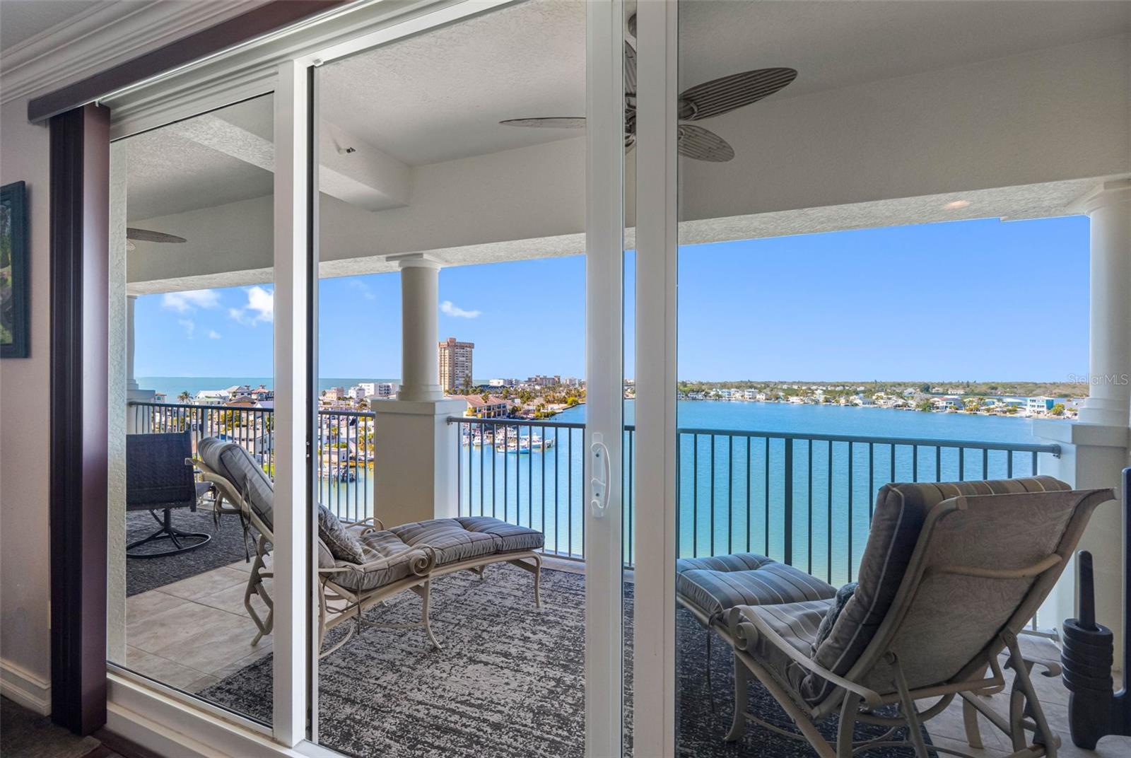 ...  Photo taken From Primary Master Suite. The 60 Foot Long Terrace Can Be Accessed From Various Rooms. Wonderful Set Up. Gulf & Intracoastal Views.. The Penthouse Floor Height Offers Fantastic Long Range Views.