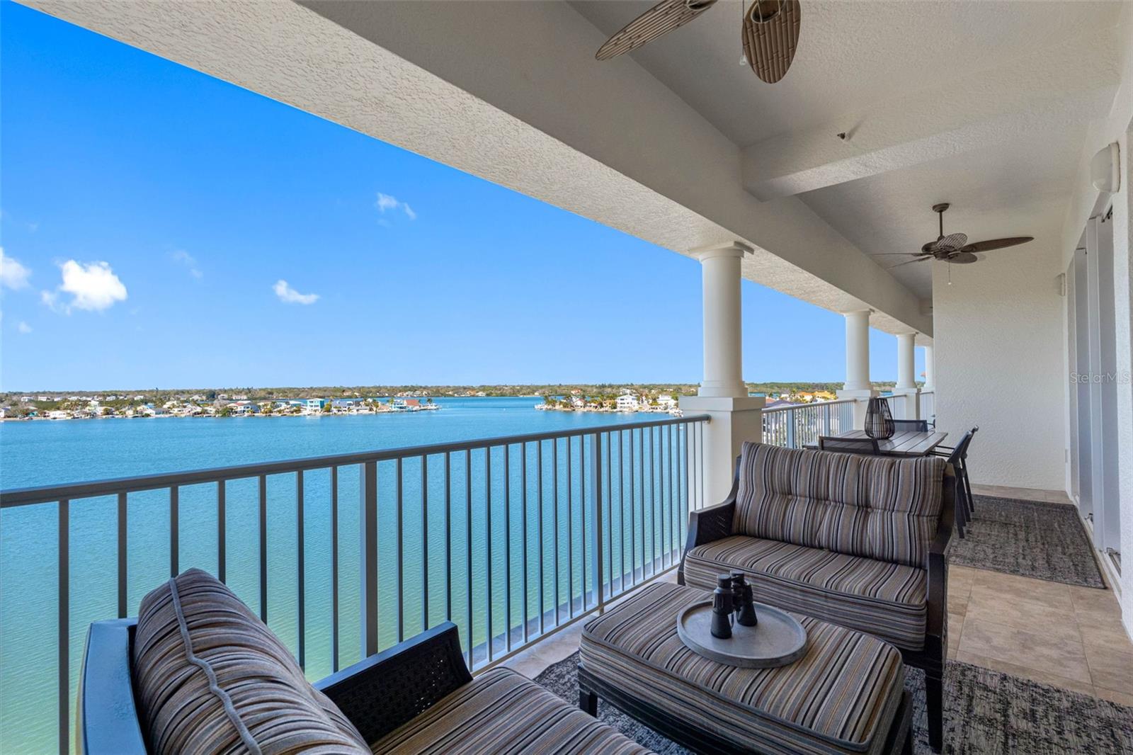 .... 60' Waterfront  Balcony  Fronts All Living  Areas, Kitchen, Art Studio  And Master Bedroom Suite.